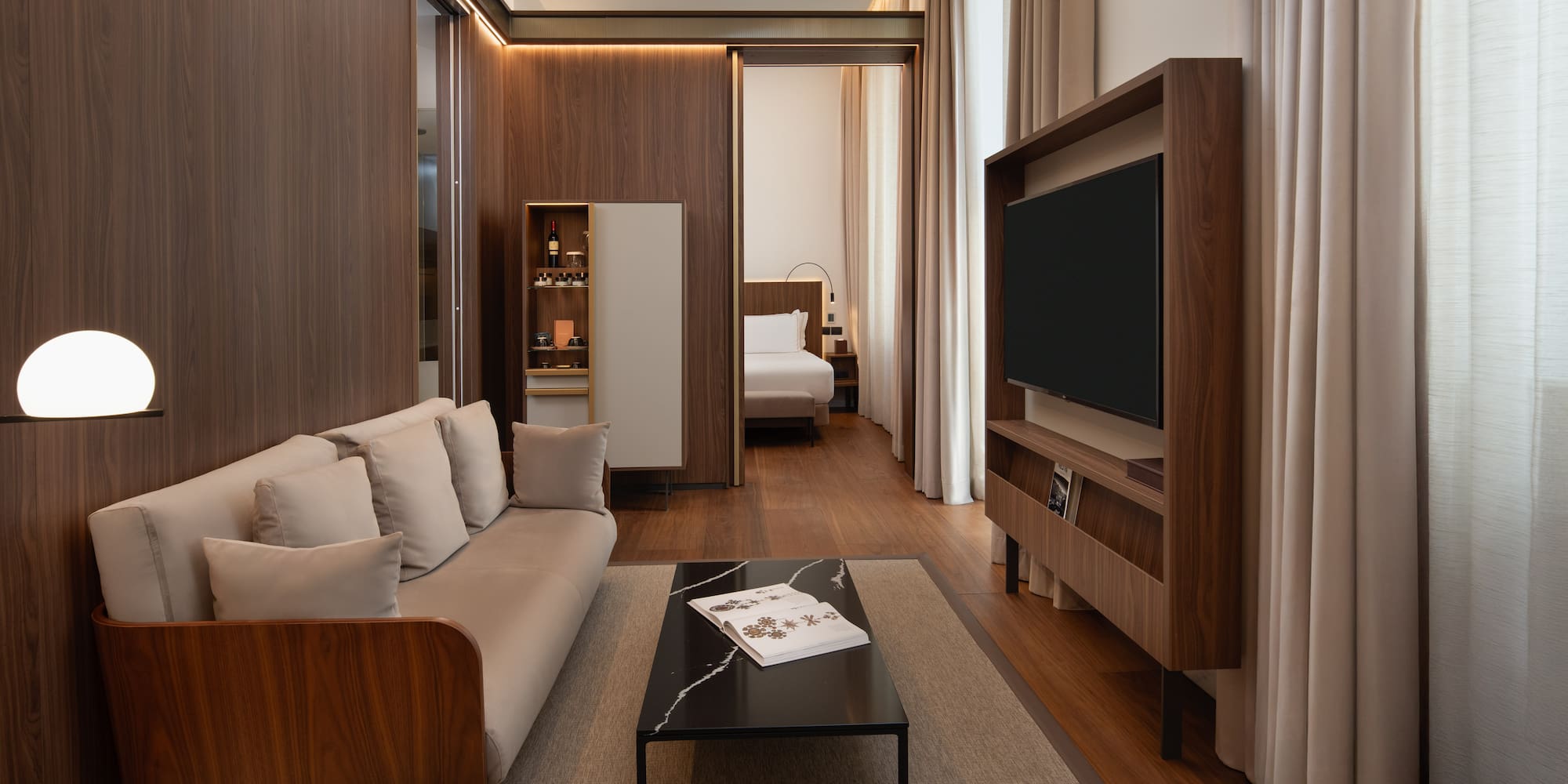 a room with a couch and a tv