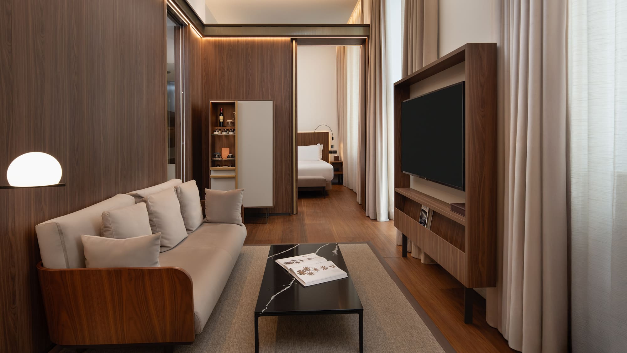 a room with a couch and a tv