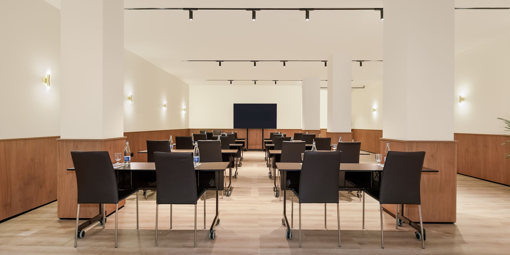 a room with tables and chairs