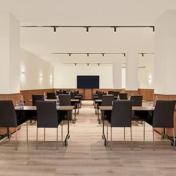 a room with tables and chairs