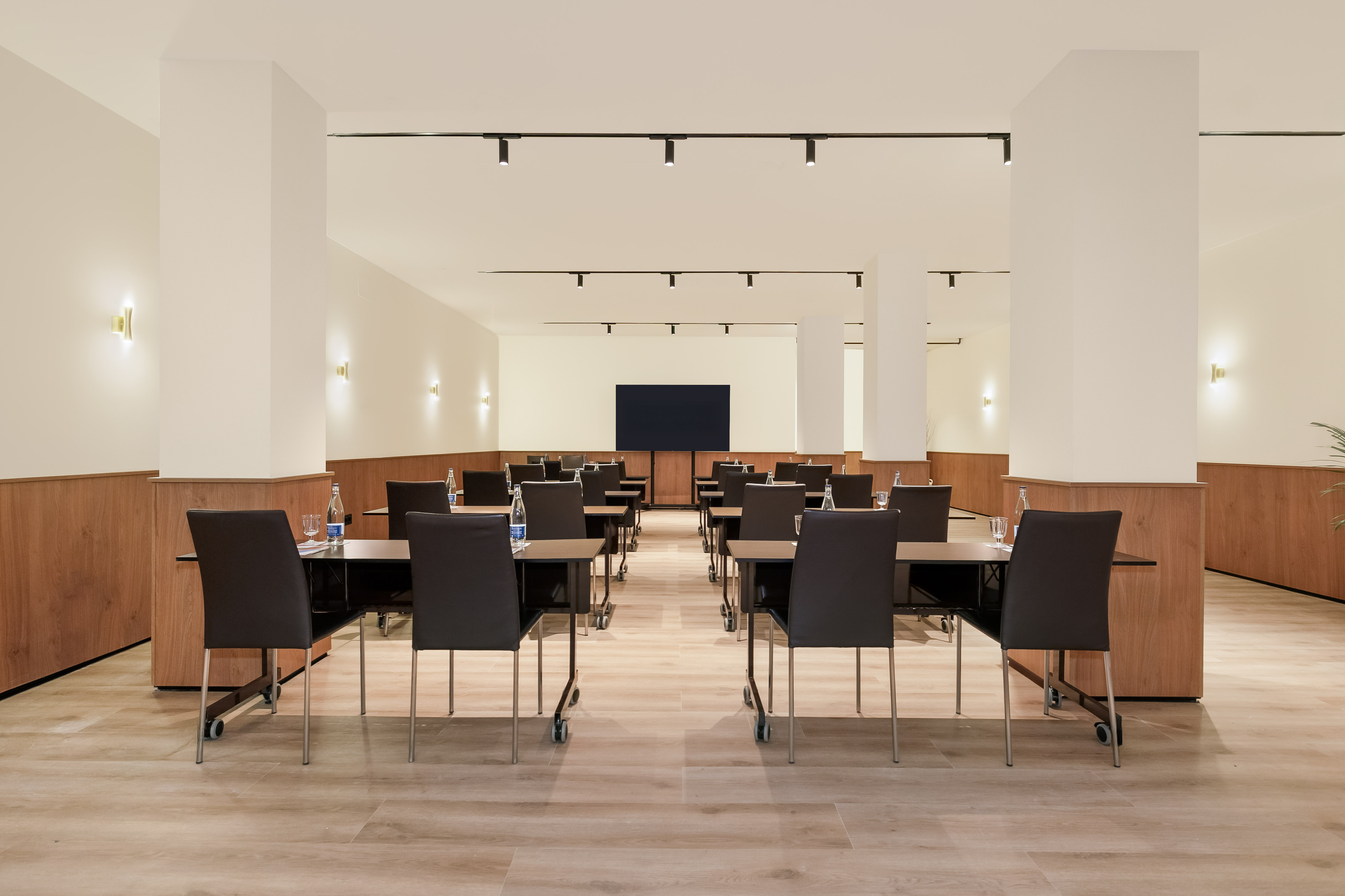 a room with tables and chairs