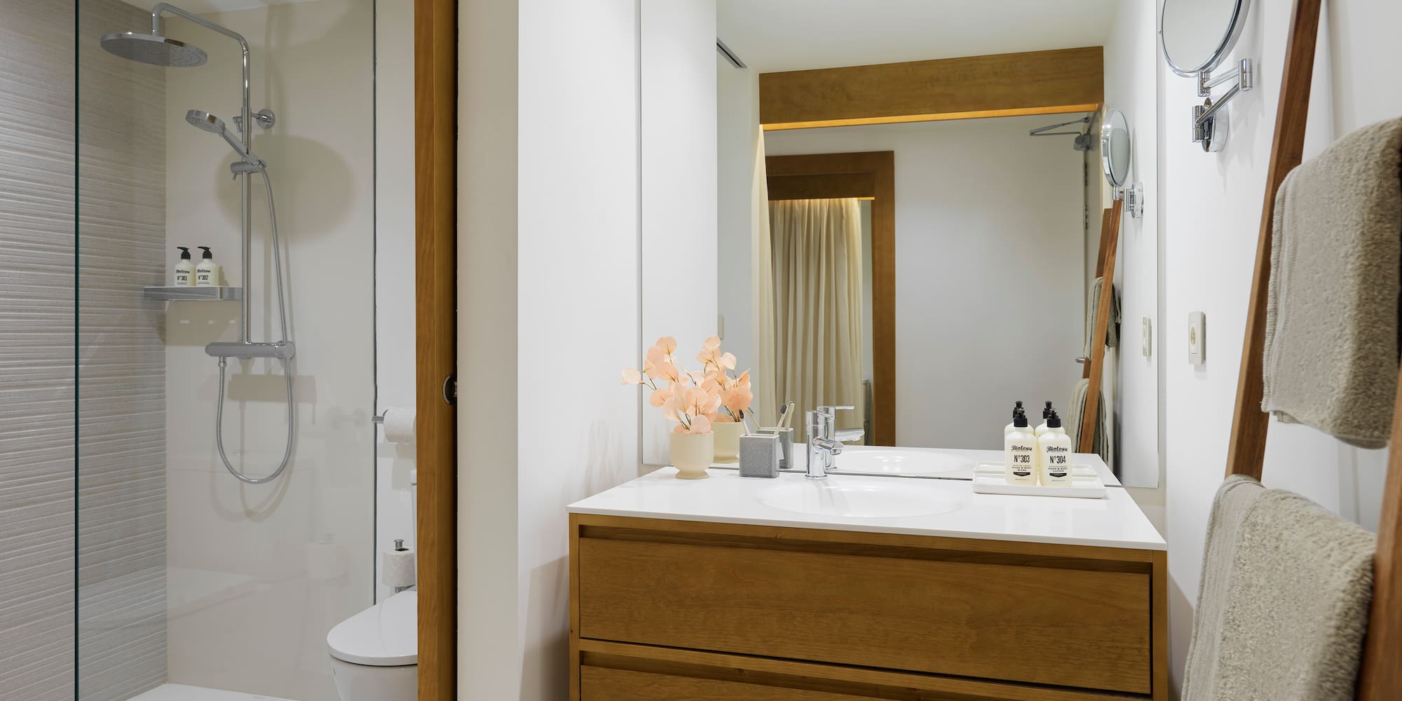 a bathroom with a sink and shower