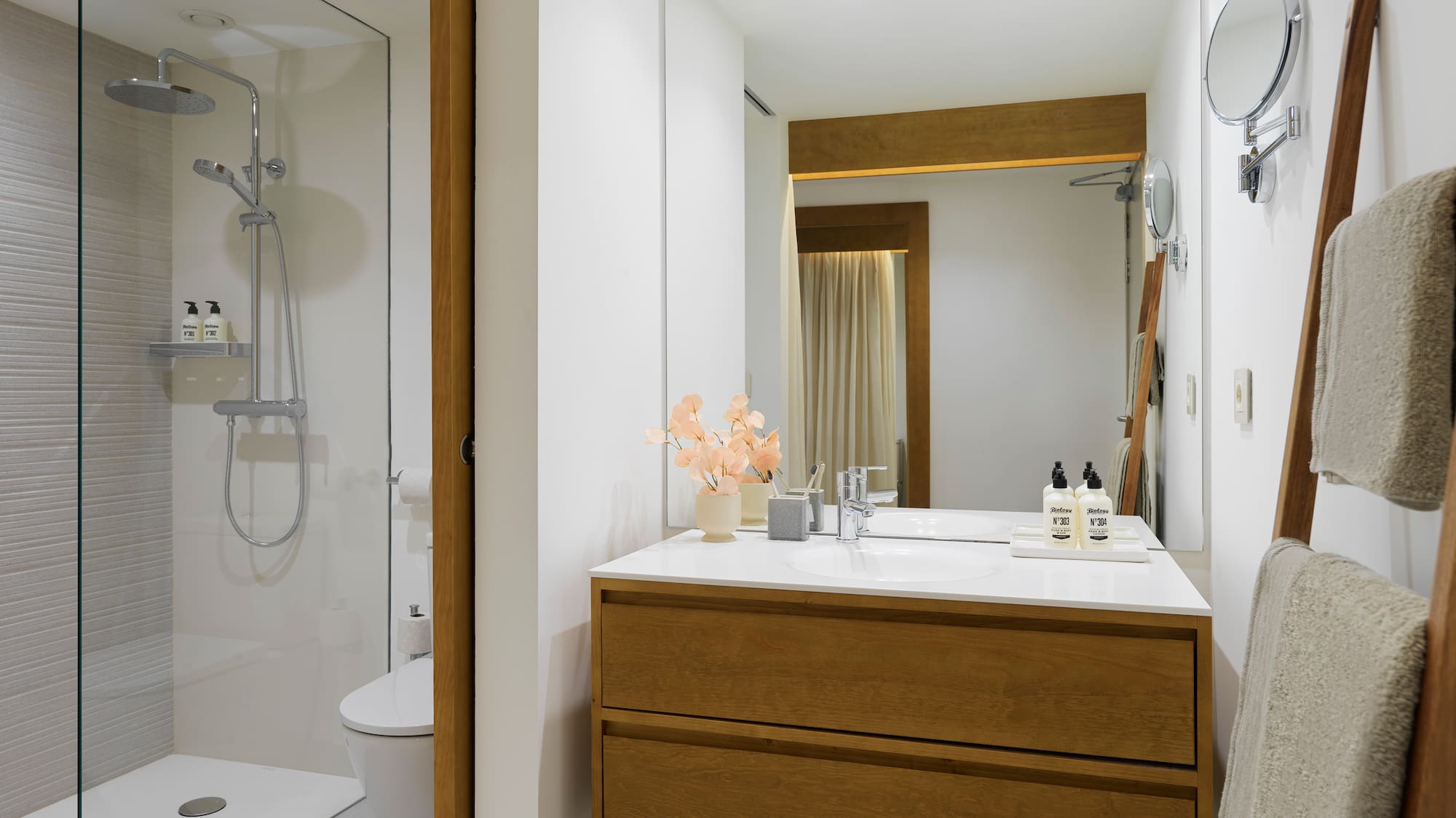 a bathroom with a sink and shower