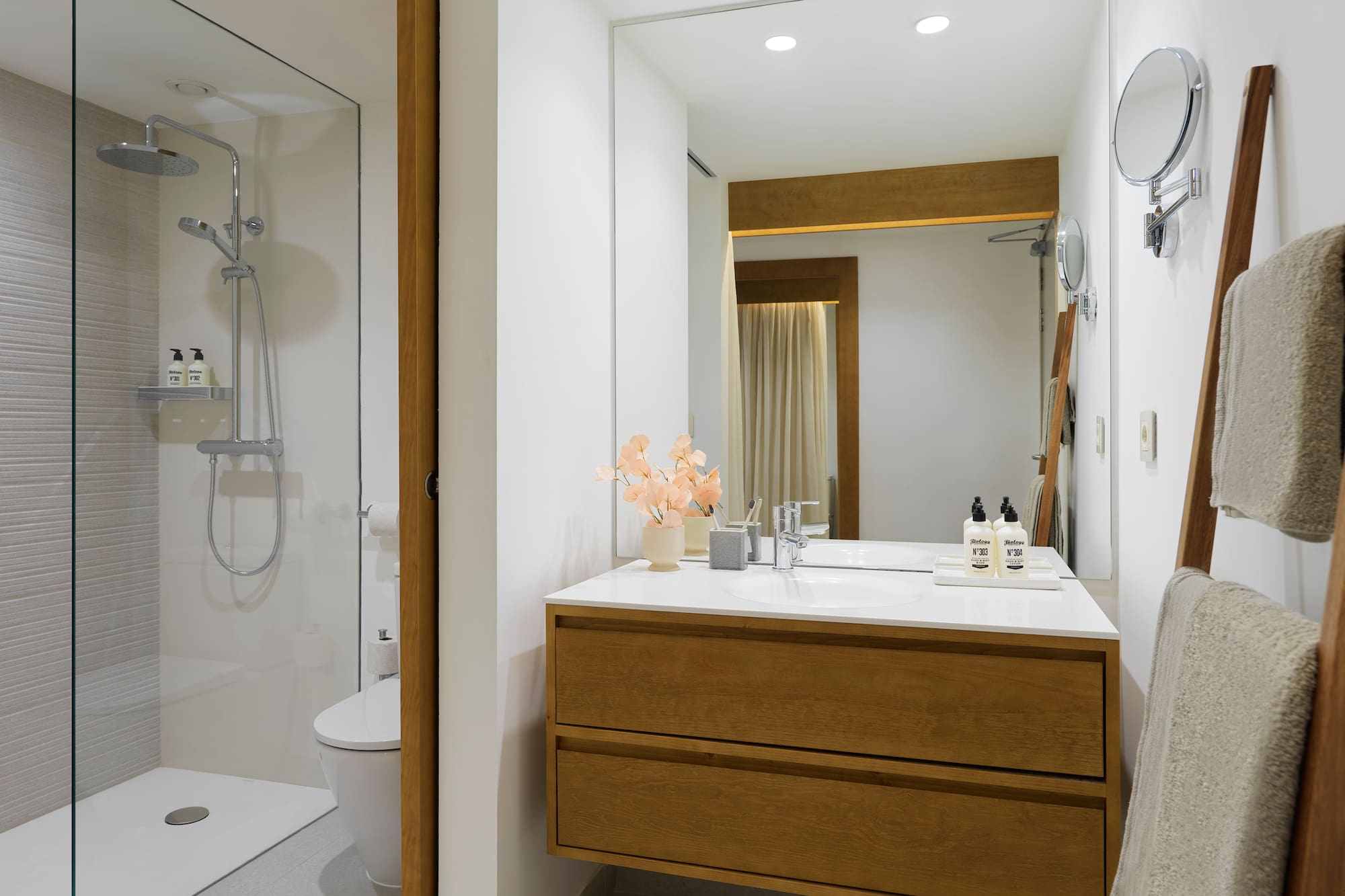 a bathroom with a sink and shower