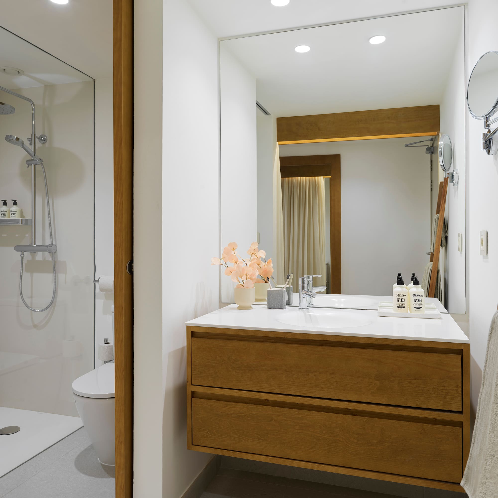 a bathroom with a sink and shower