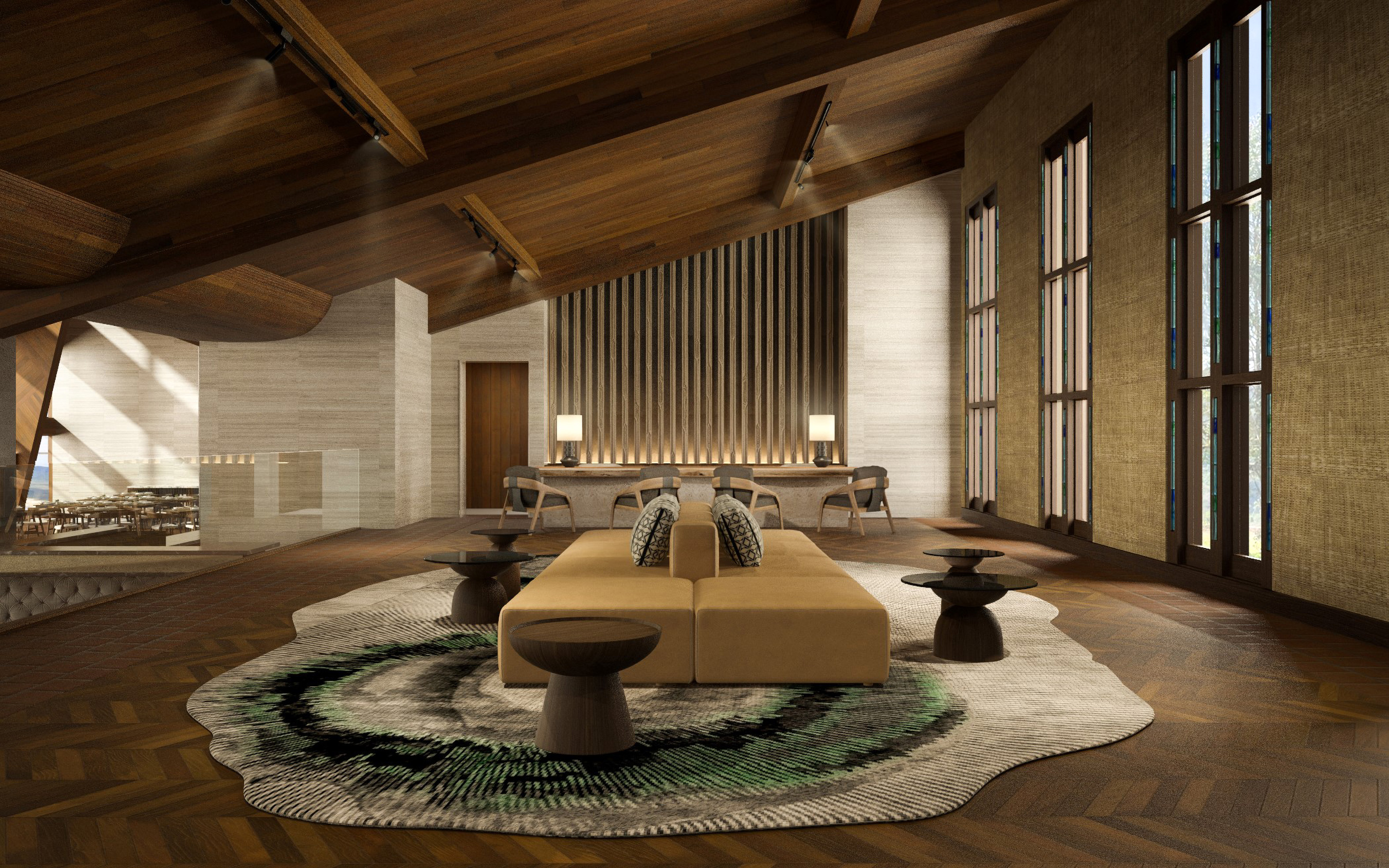 a room with a large couch and tables