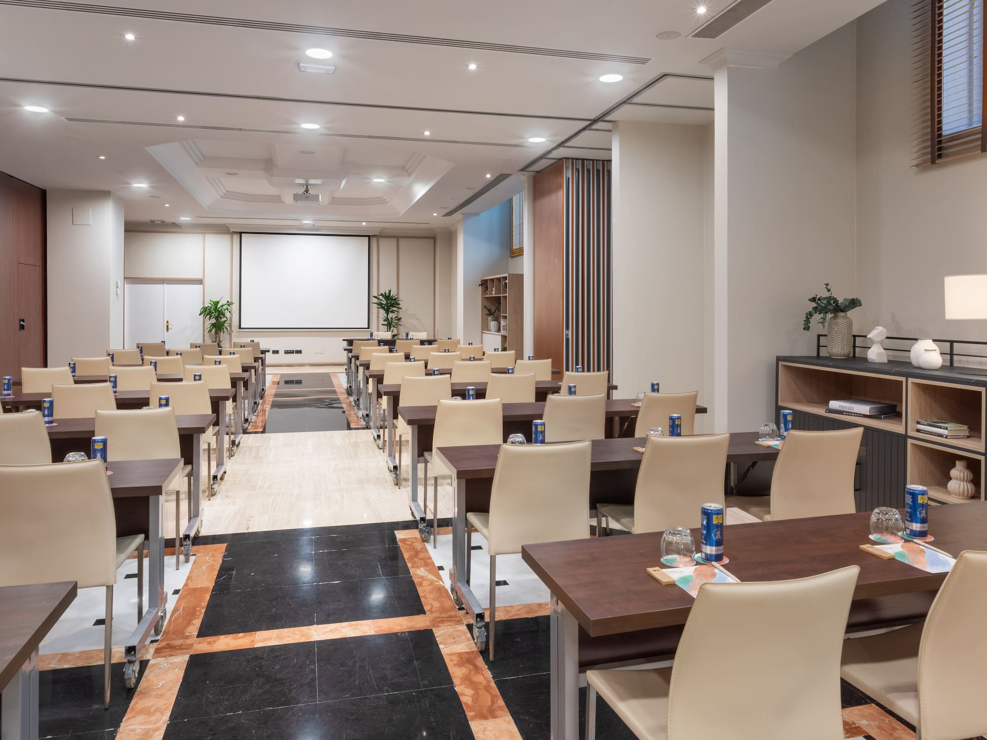 a room with tables and chairs