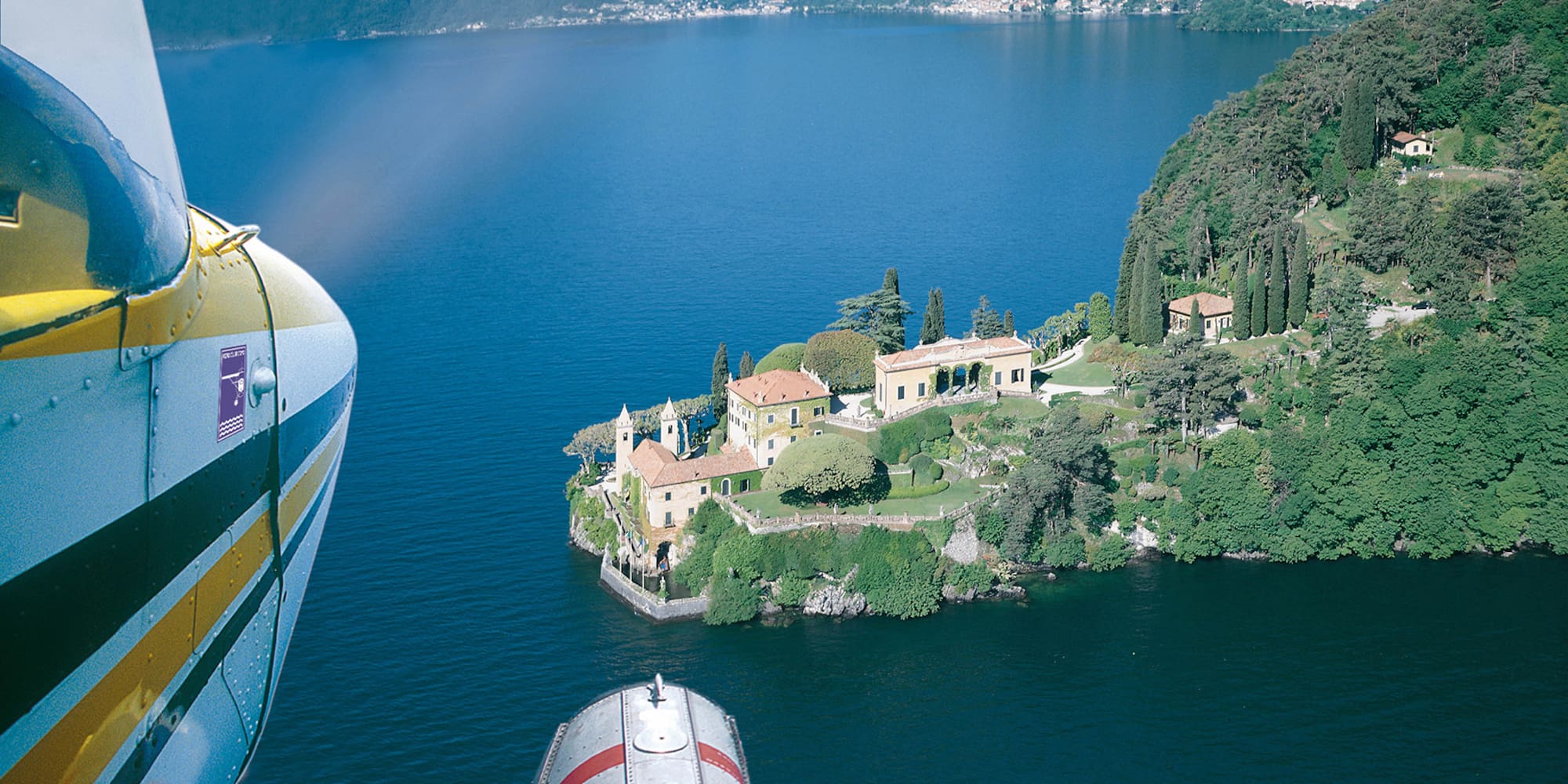 a house on an island surrounded by water