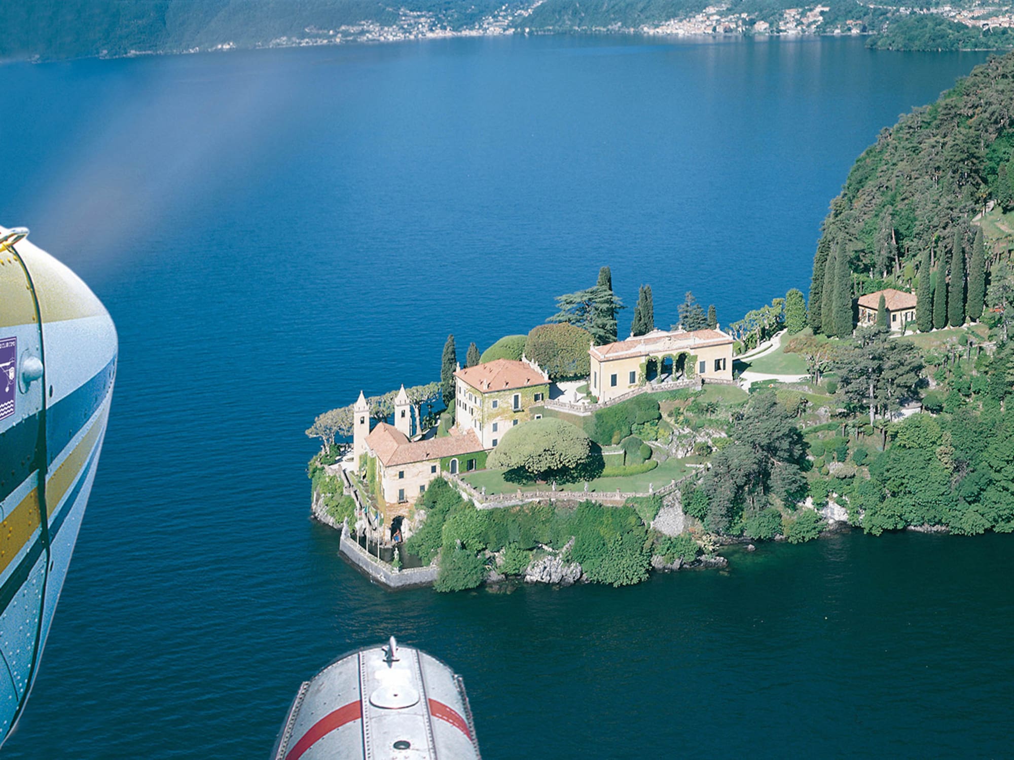 a house on an island surrounded by water