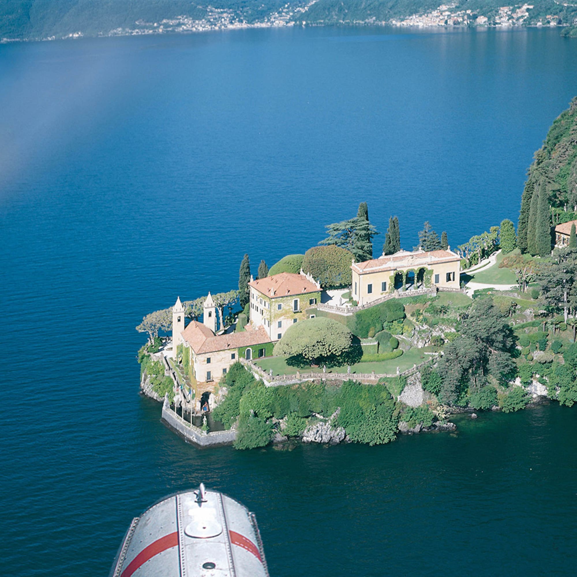 a house on an island surrounded by water