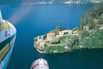 a house on an island surrounded by water