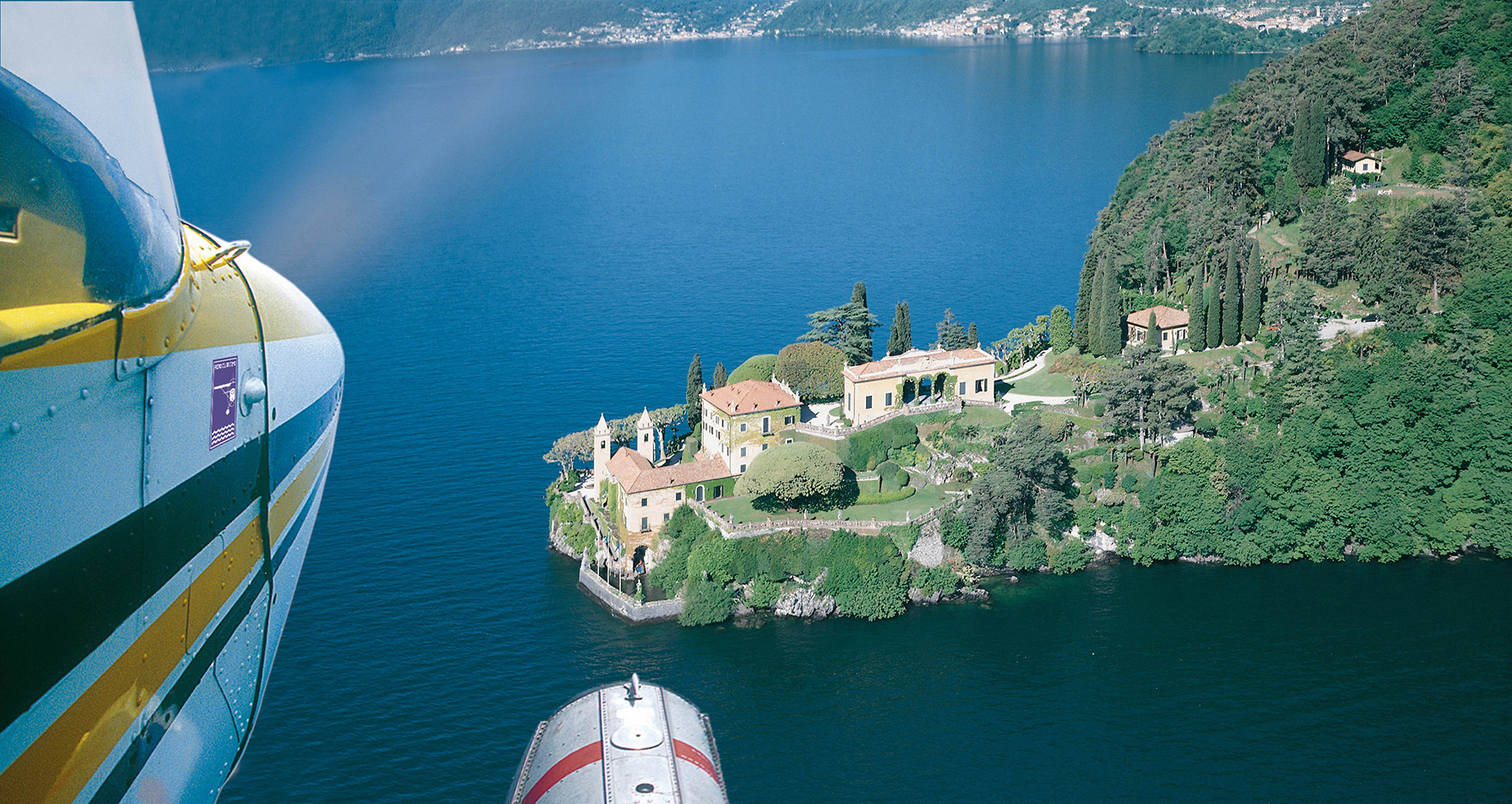 a house on an island surrounded by water