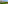 a building with trees and grass