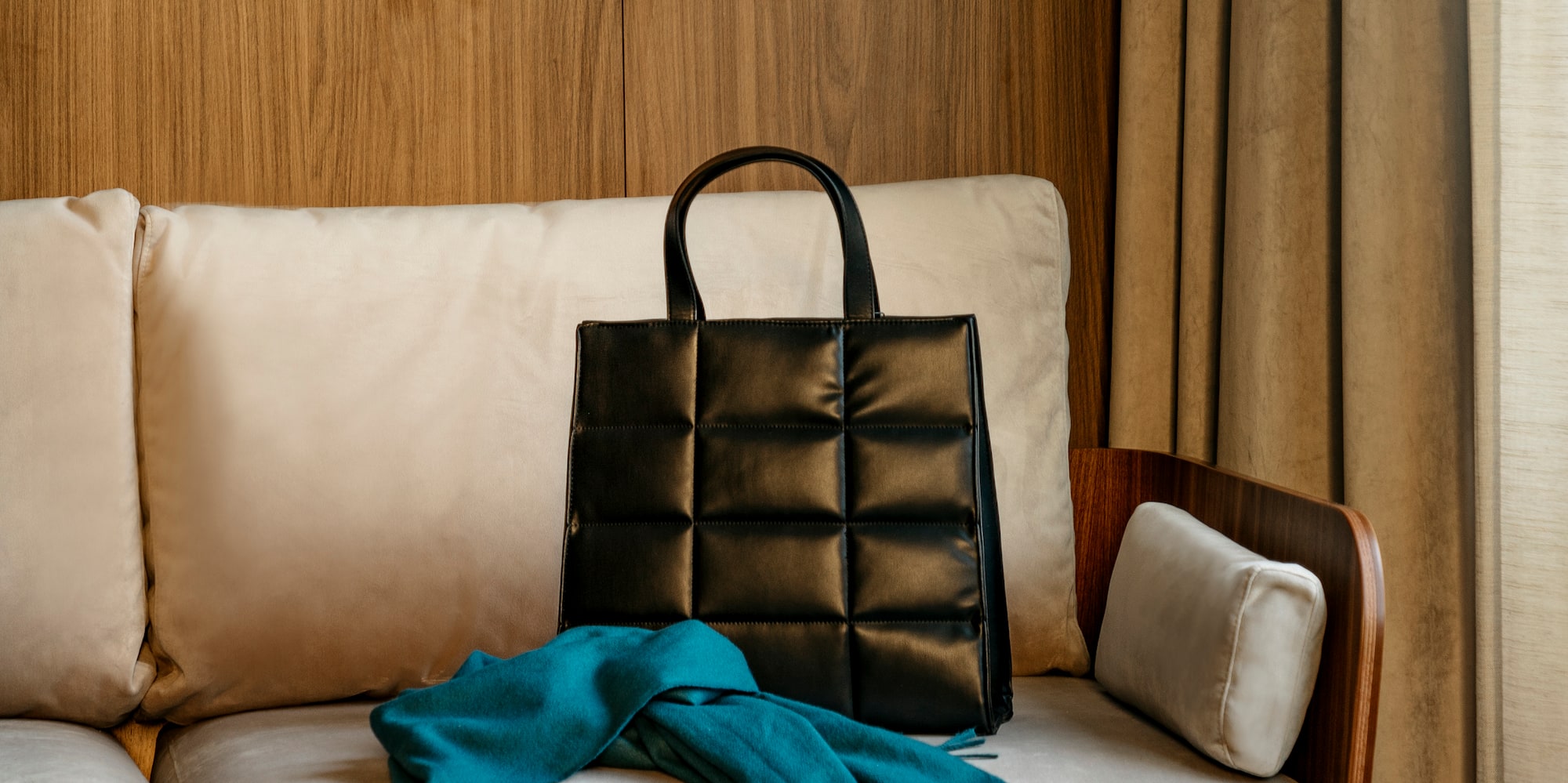 a black bag on a couch