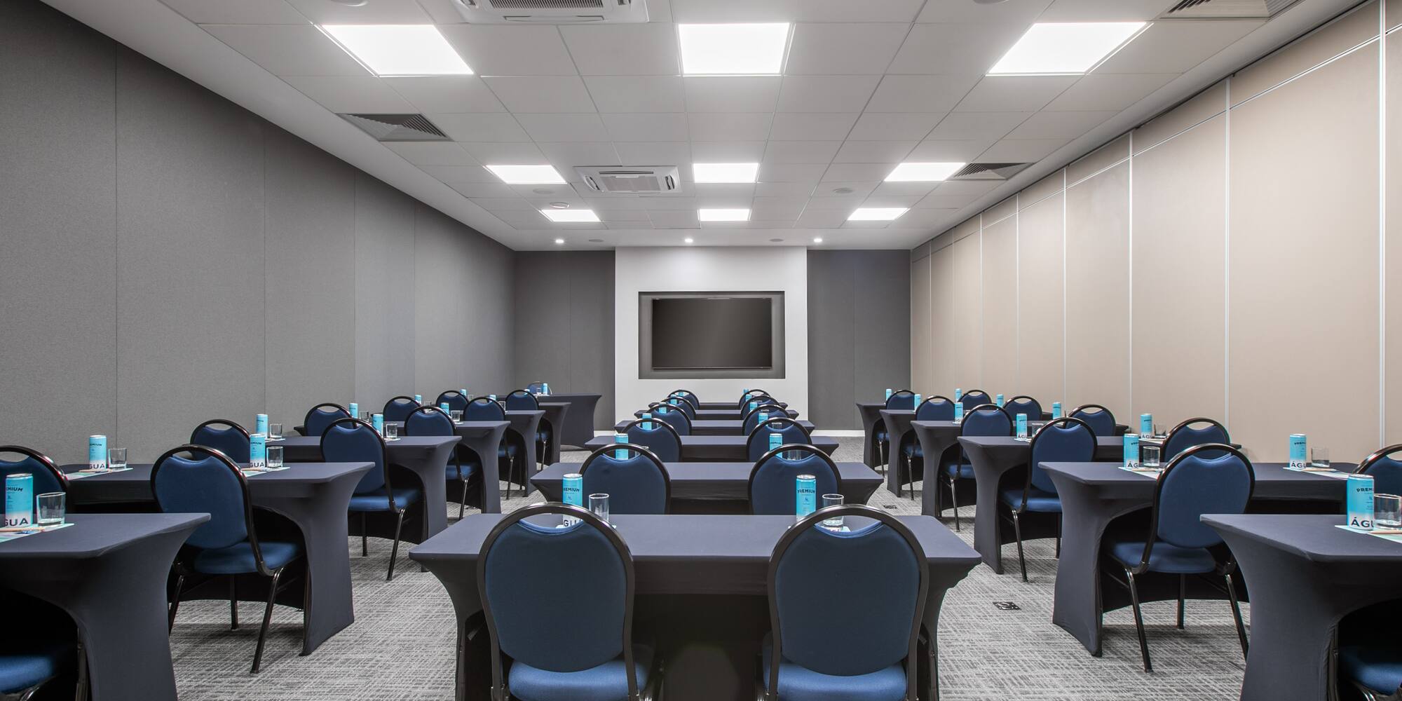 a room with tables and chairs