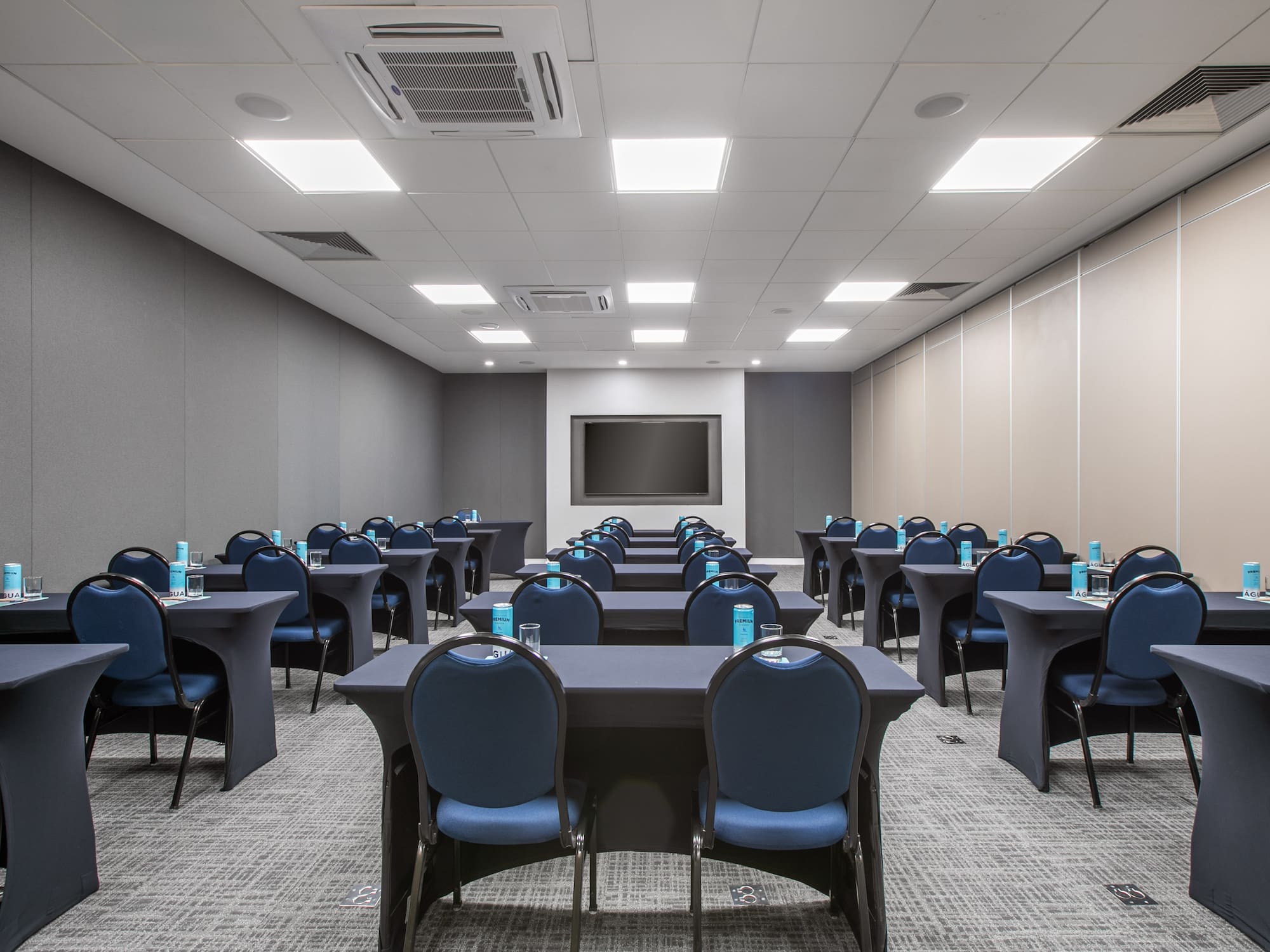 a room with tables and chairs