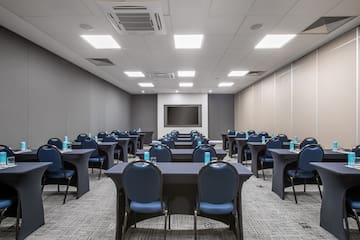 a room with tables and chairs