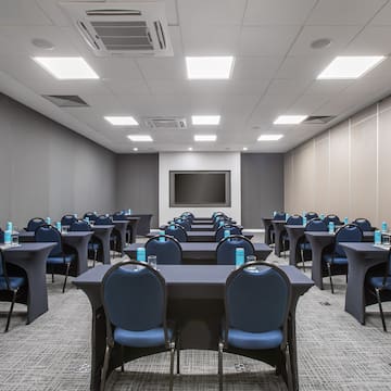 a room with tables and chairs