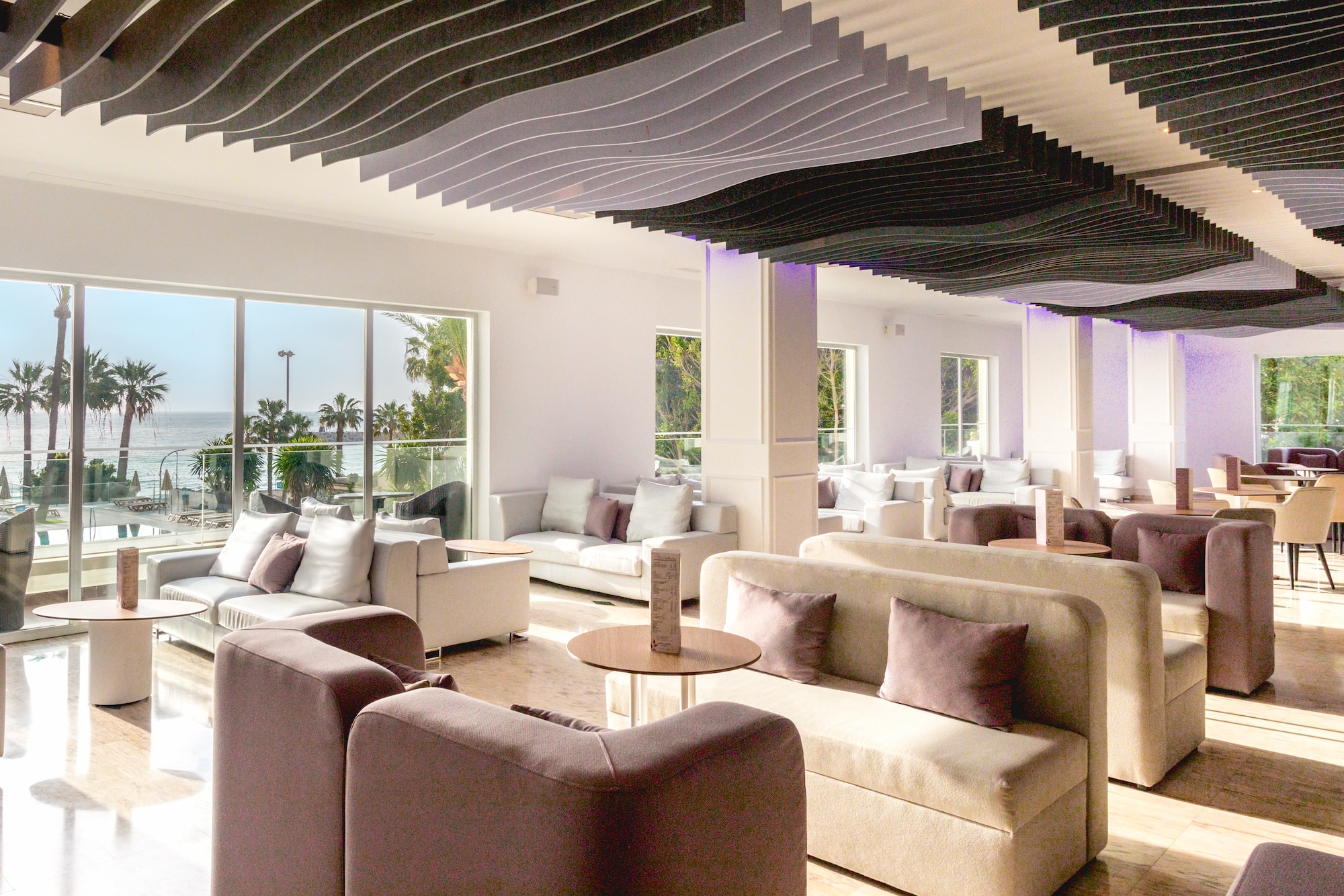 a room with couches and tables