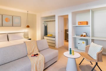 a room with a couch and a small table