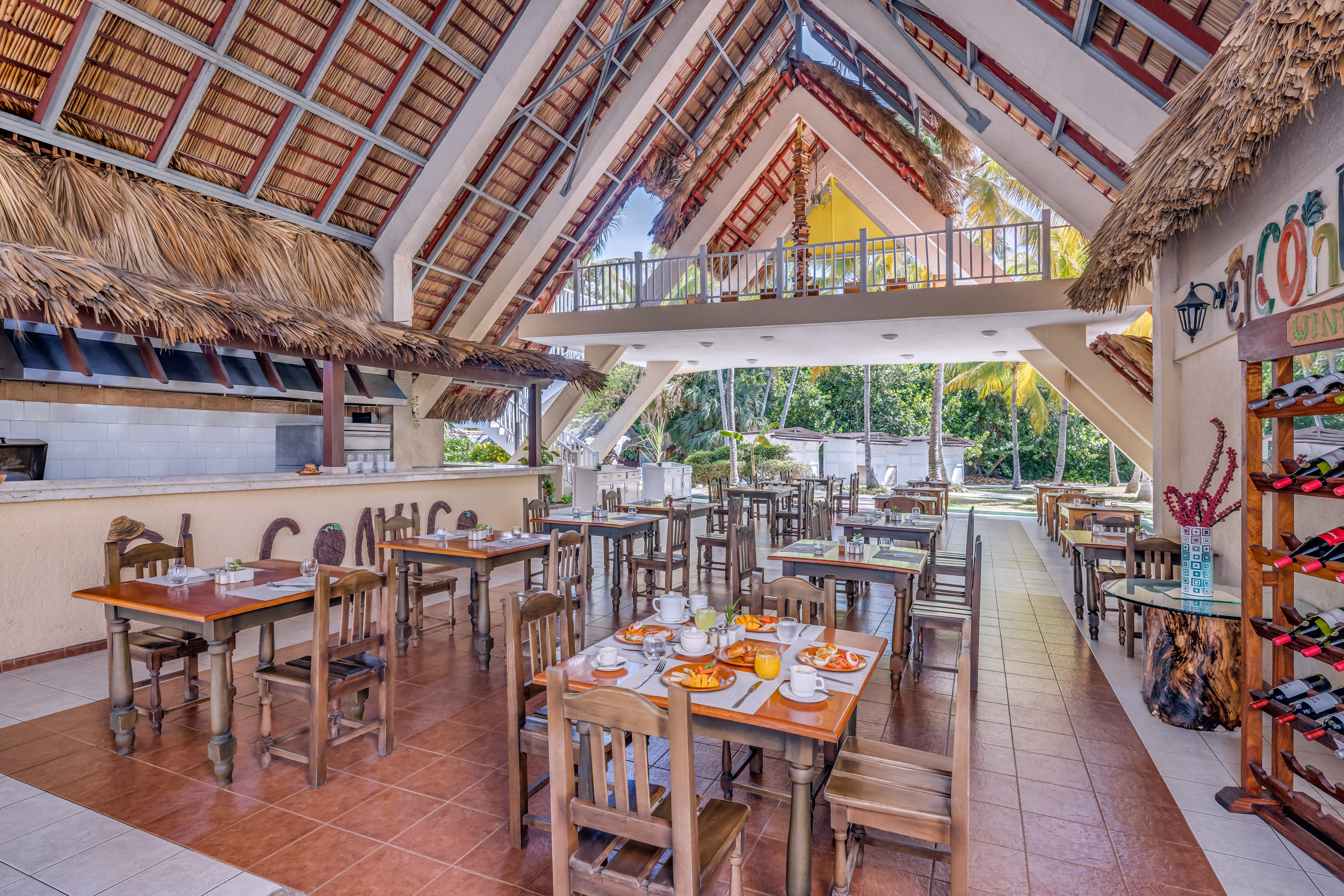 a restaurant with tables and chairs