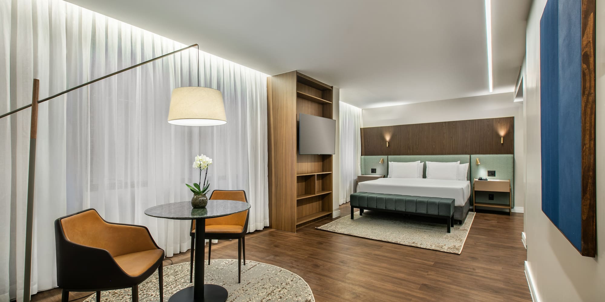 a room with a bed and a table