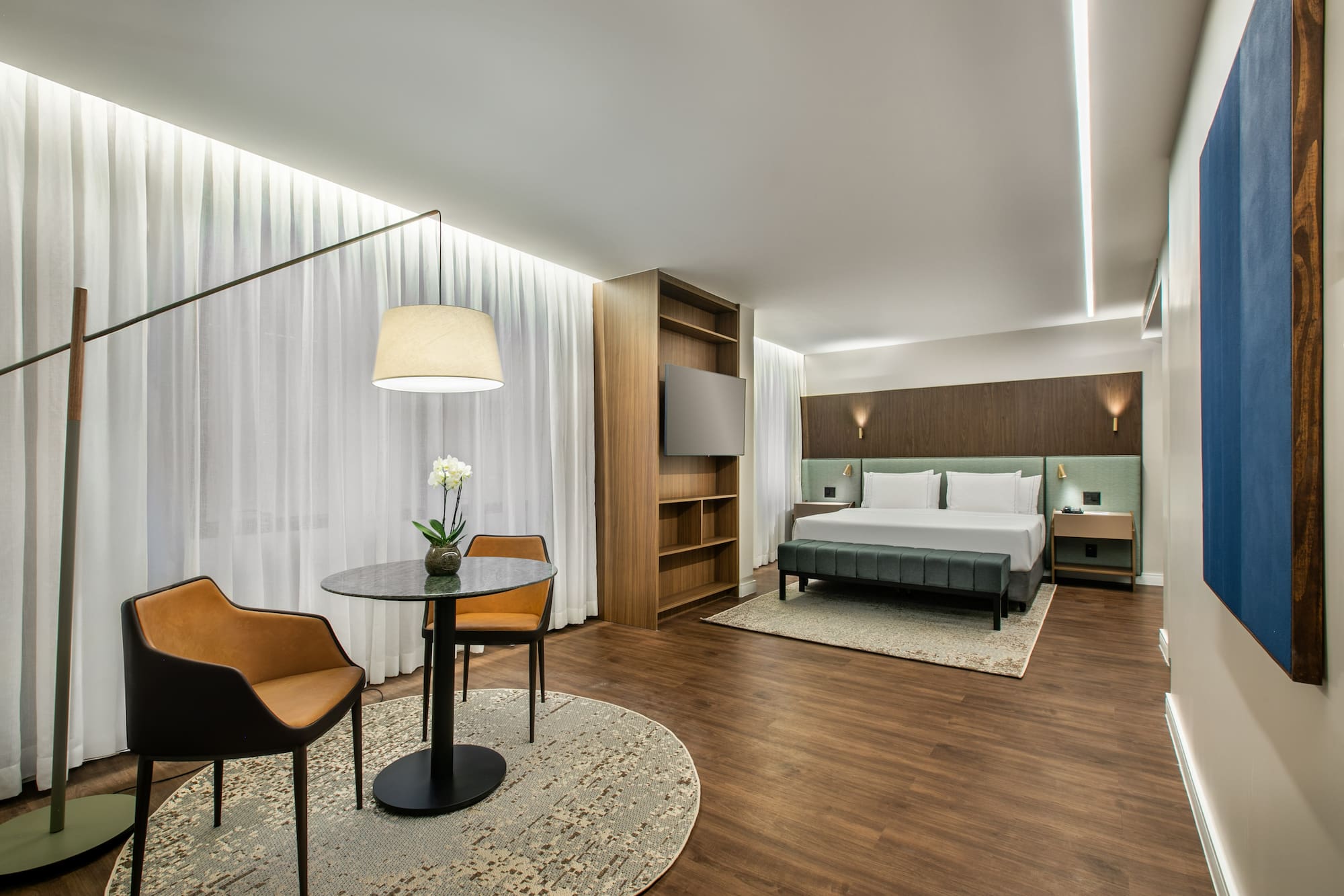 a room with a bed and a table