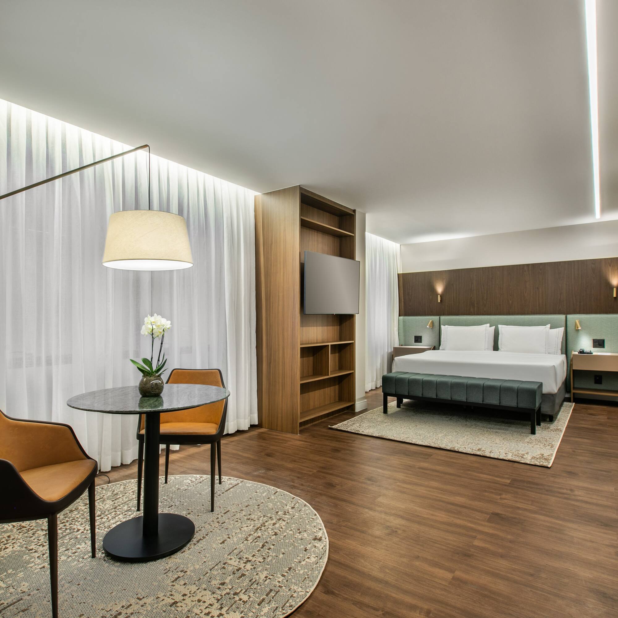 a room with a bed and a table