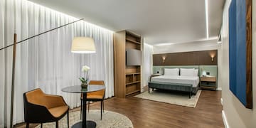 a room with a bed and a table