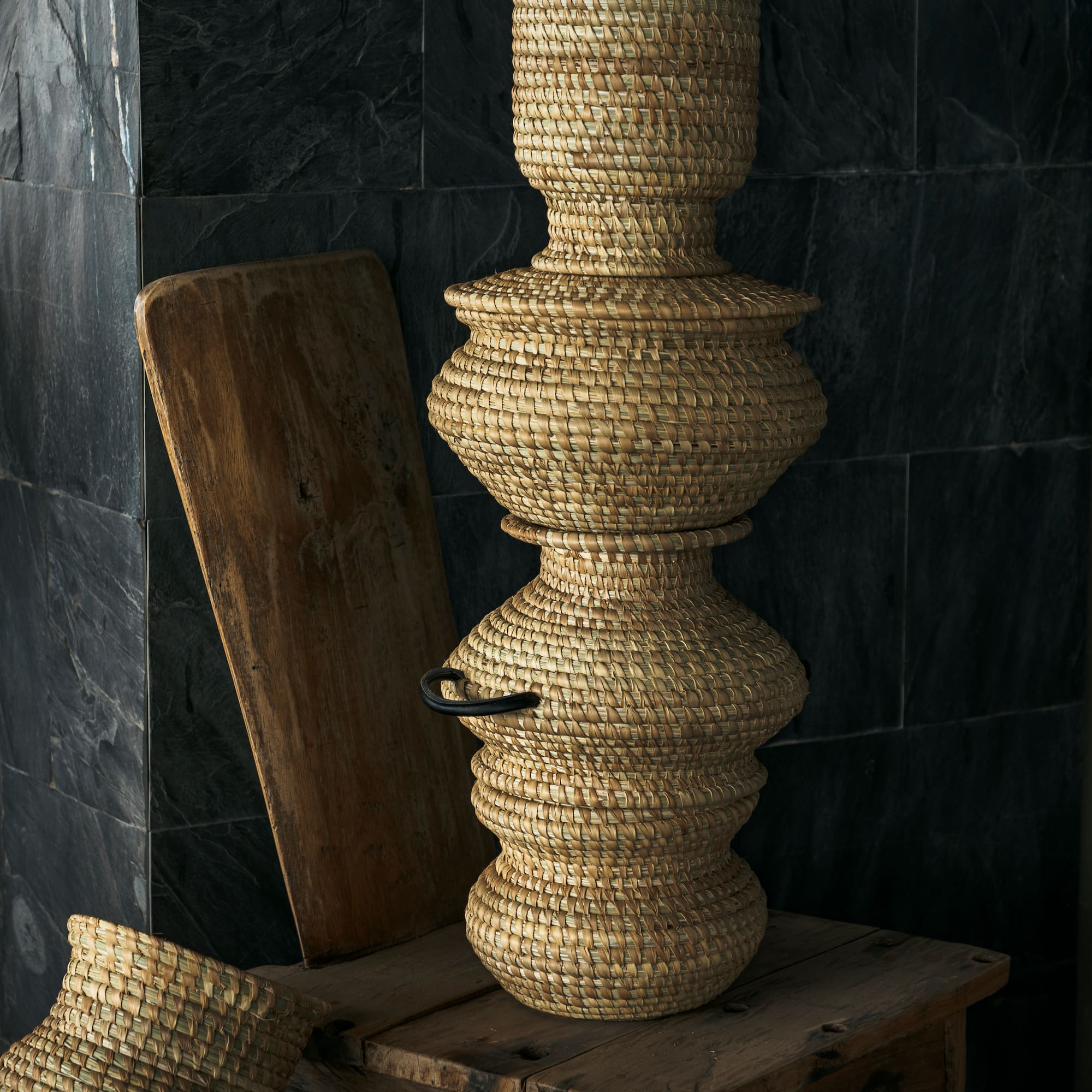 a stack of woven baskets