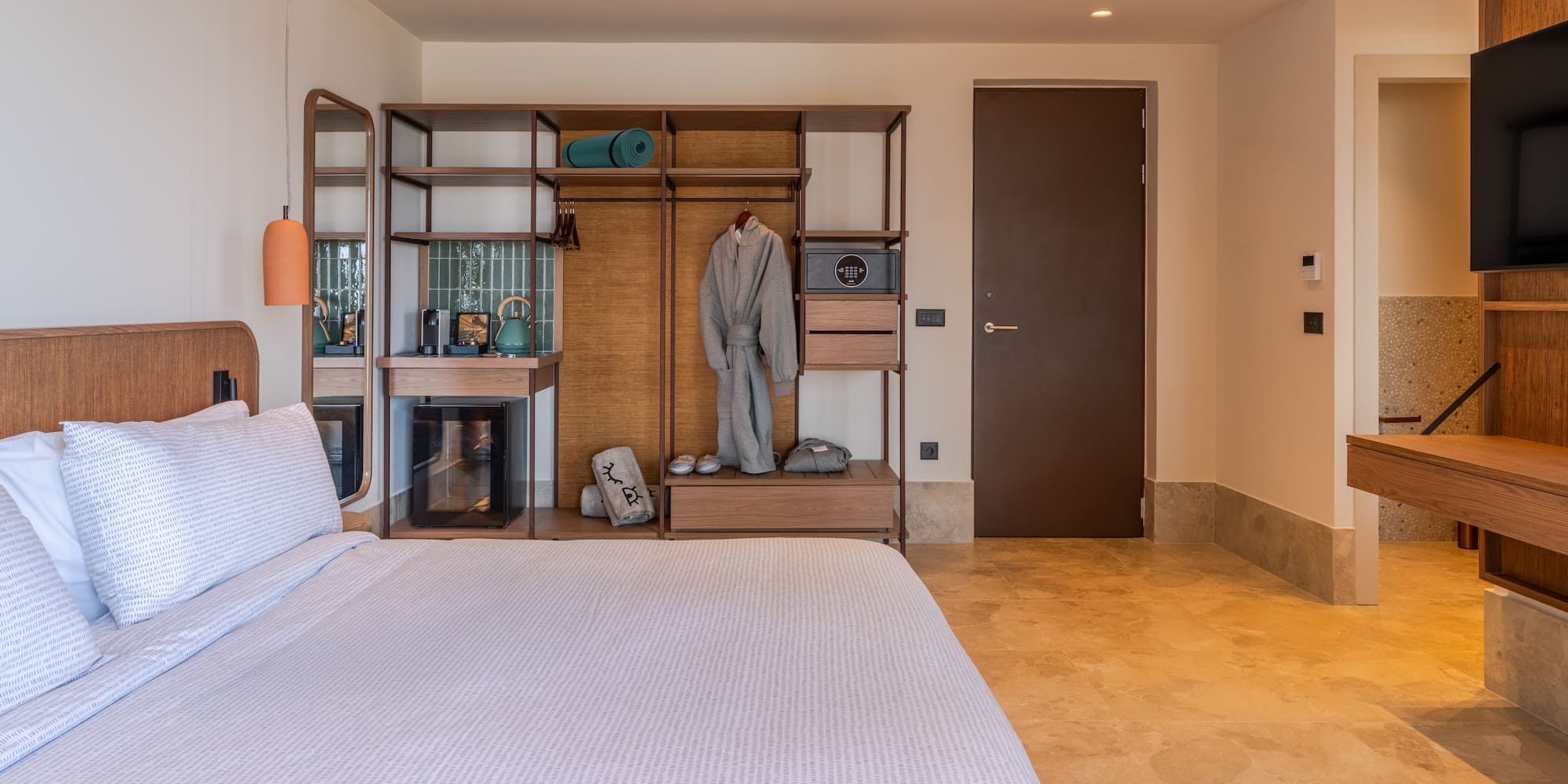 a room with a bed and a closet