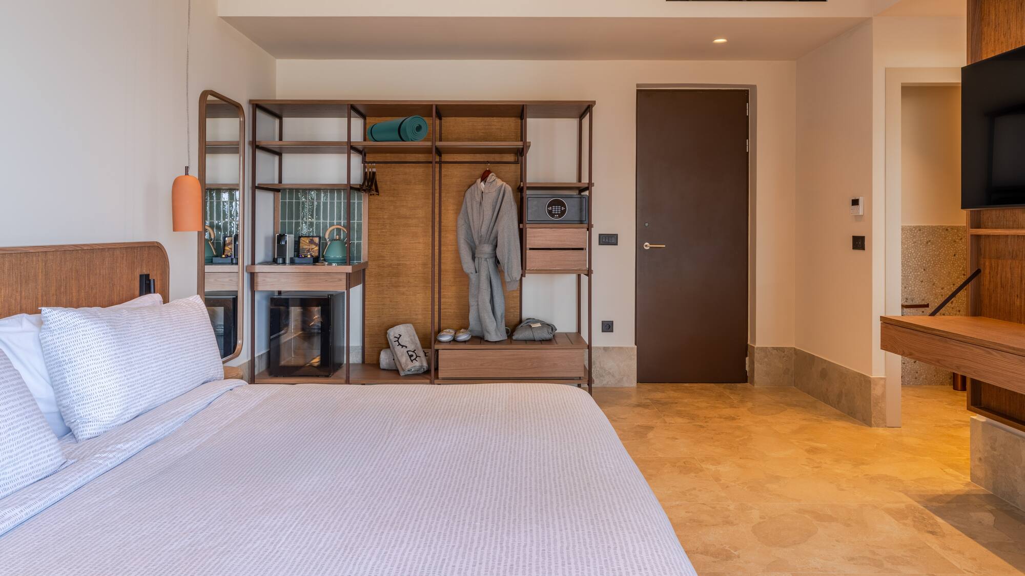 a room with a bed and a closet