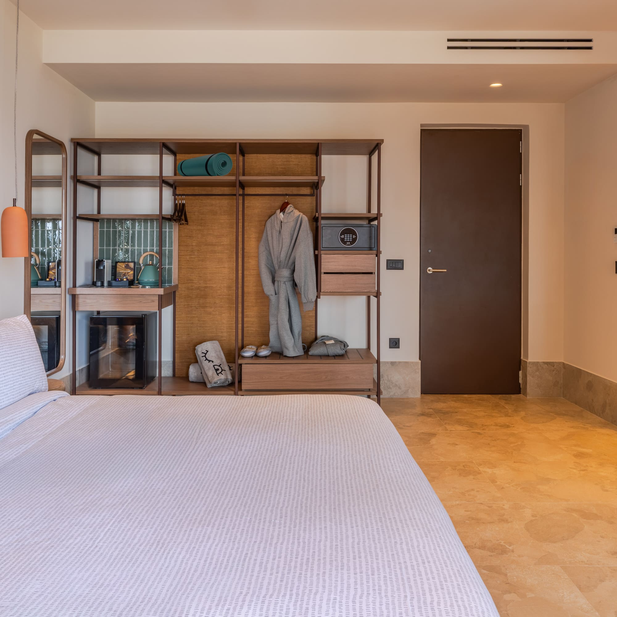 a room with a bed and a closet