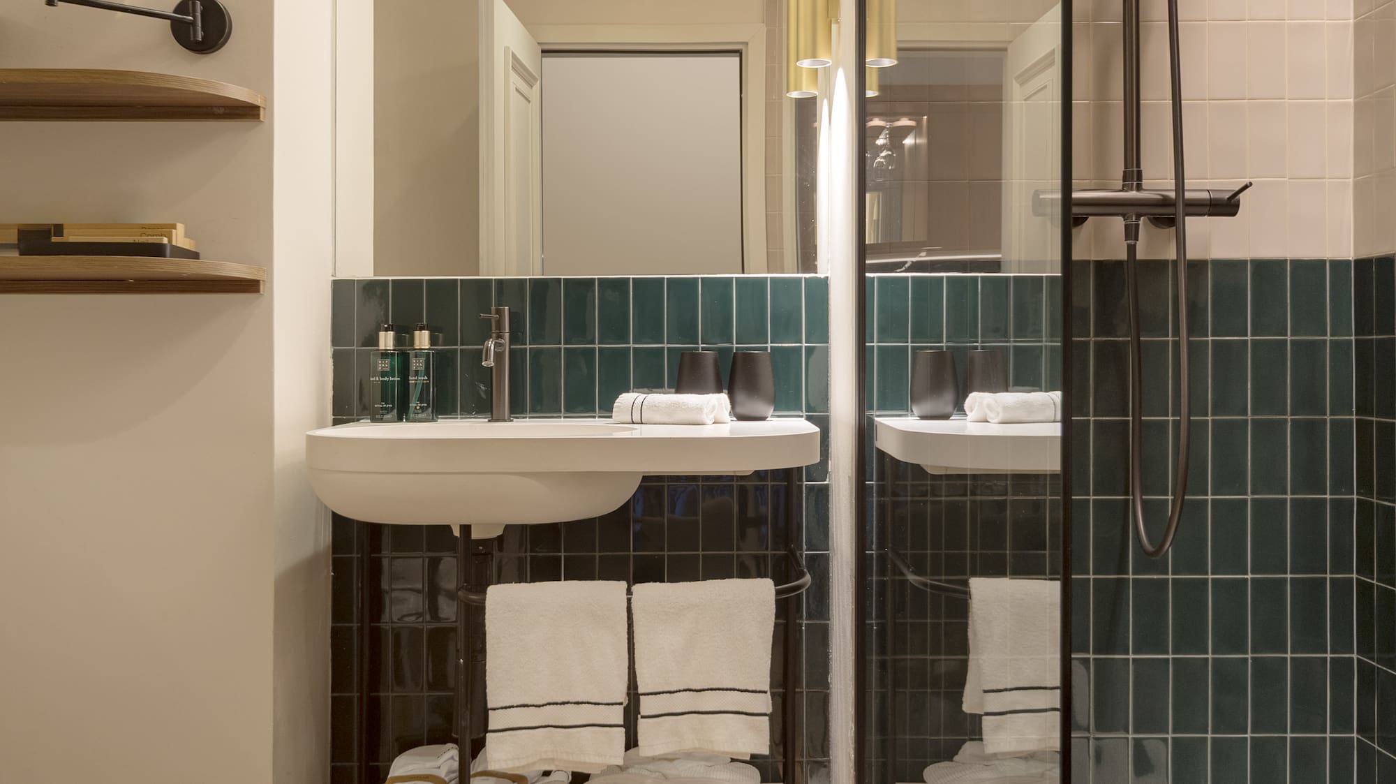 a bathroom with a shower and sink