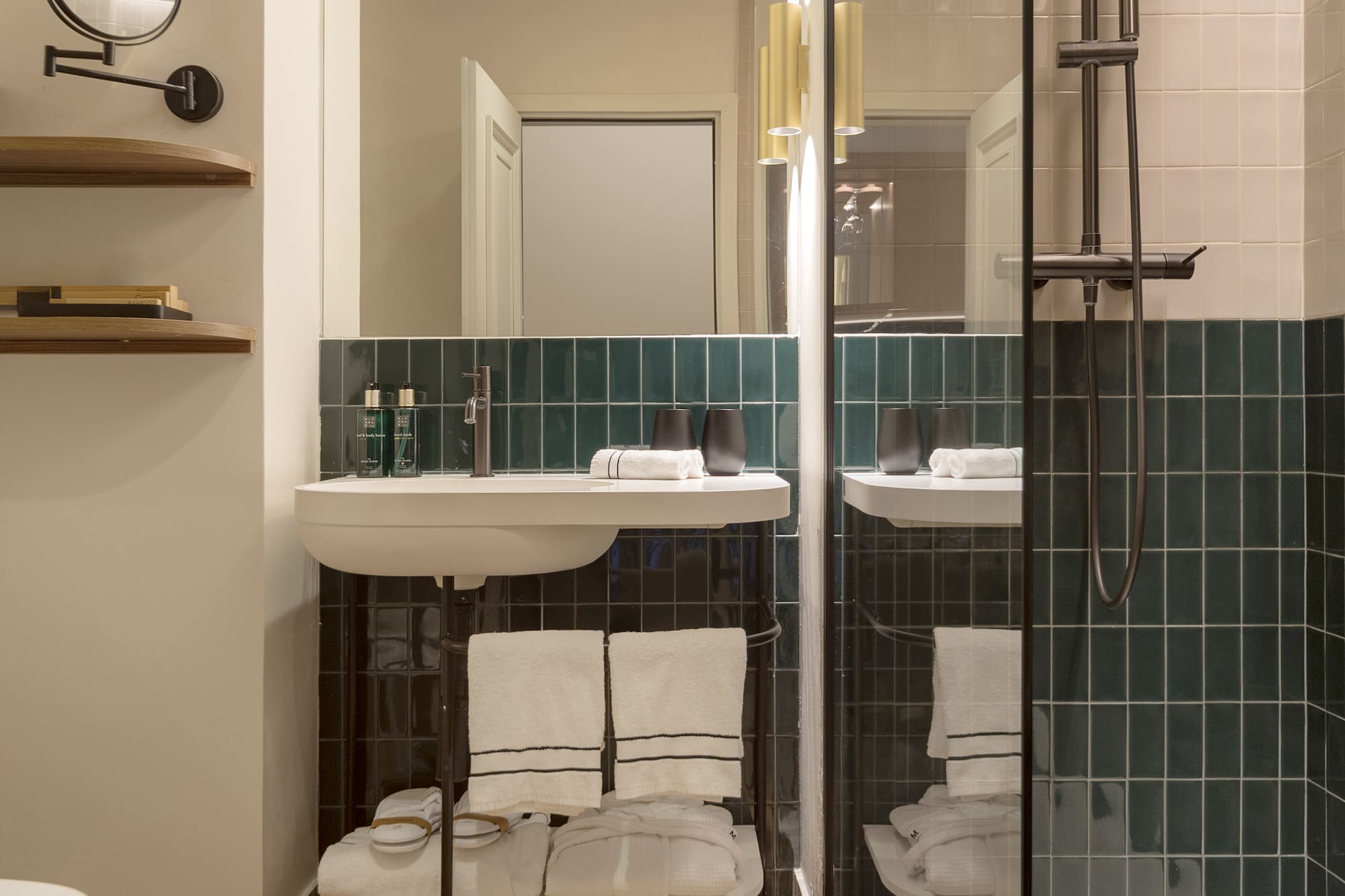 a bathroom with a shower and sink