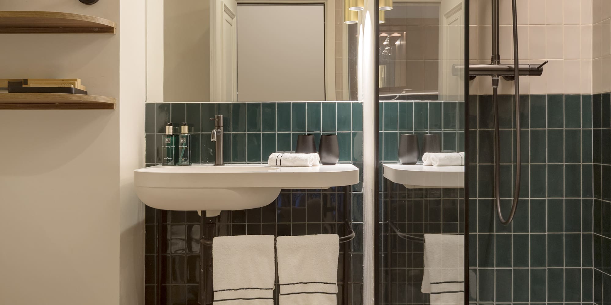 a bathroom with a shower and sink