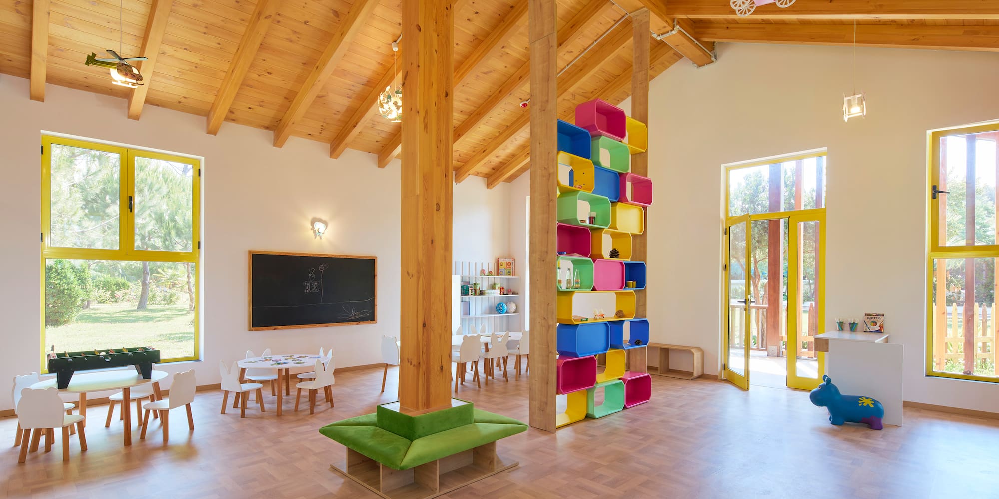 a room with a large wall and a large window