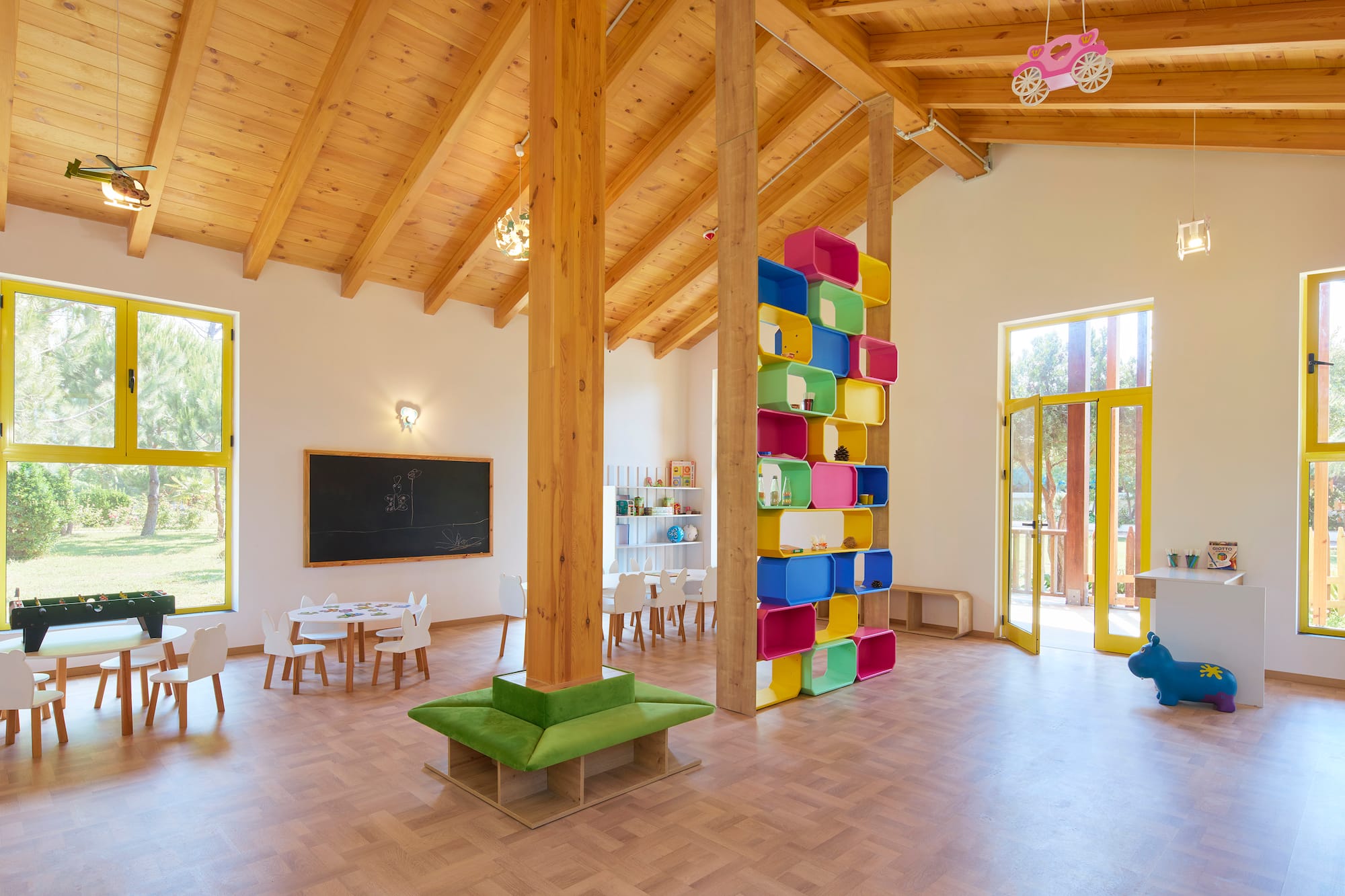 a room with a large wall and a large window