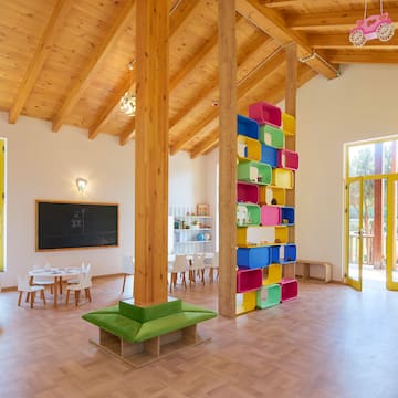 a room with a large wall and a large window