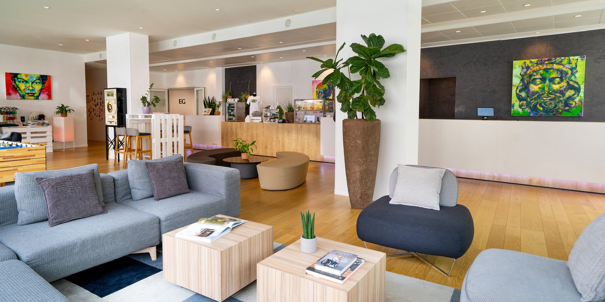 a room with a couch and tables