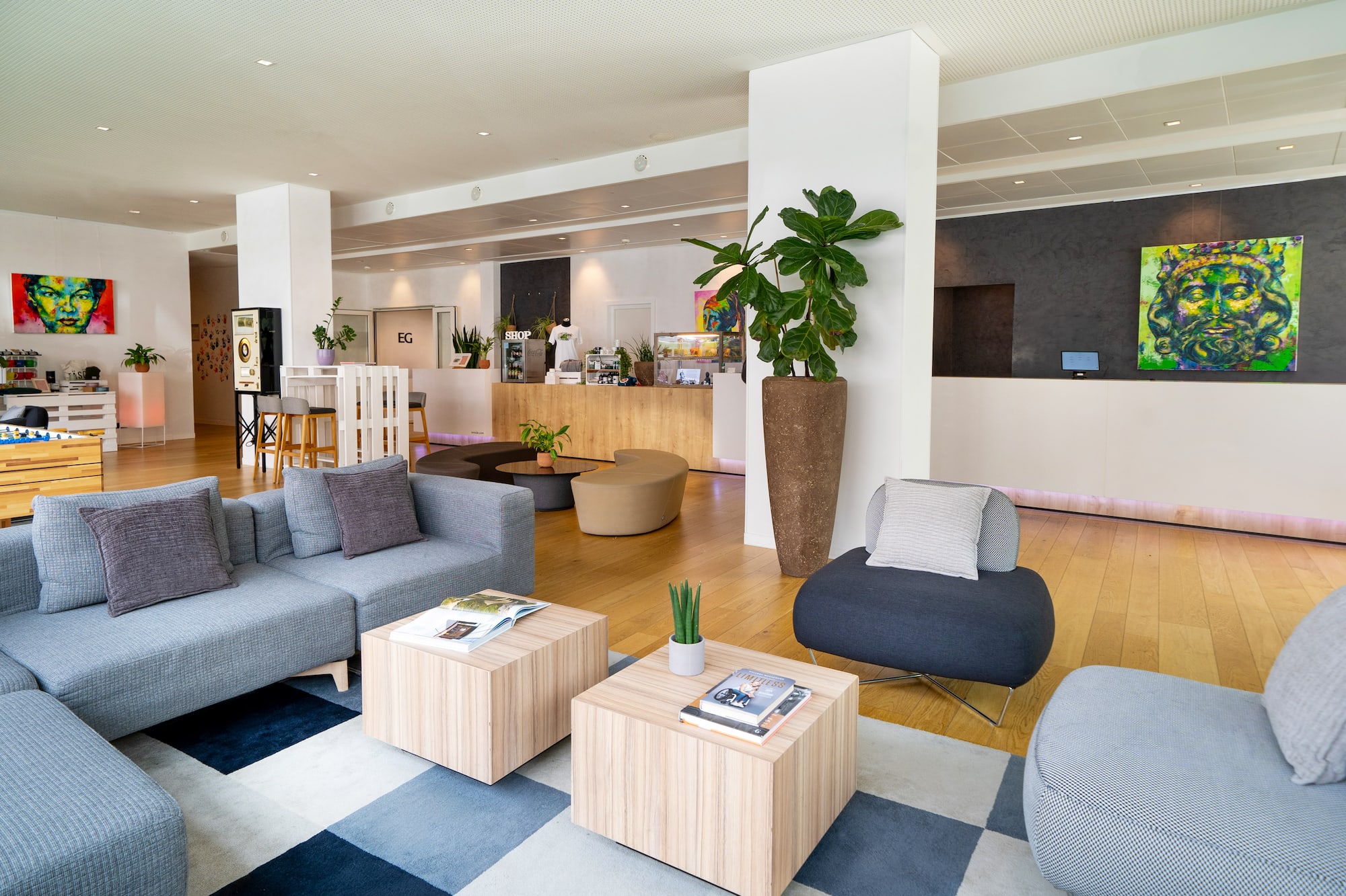 a room with a couch and tables