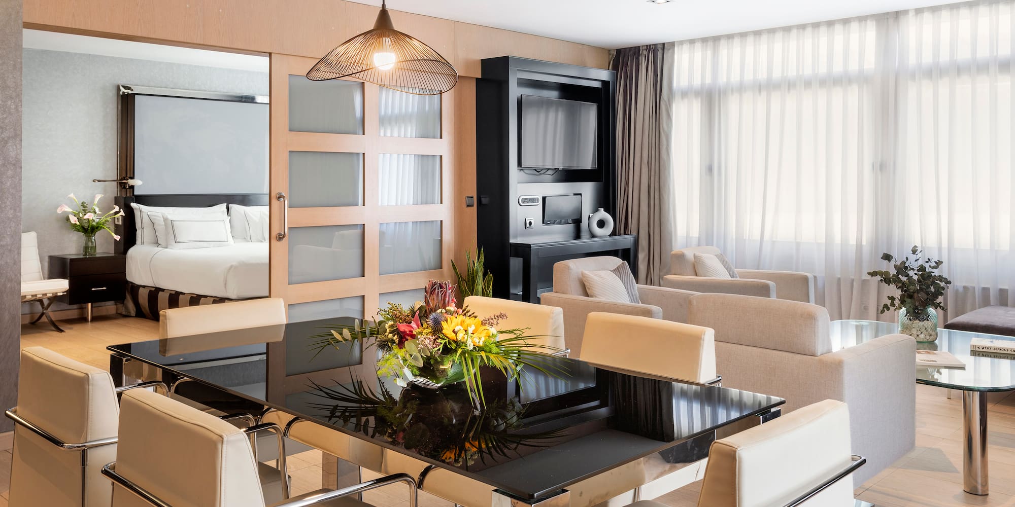 a room with a table and chairs