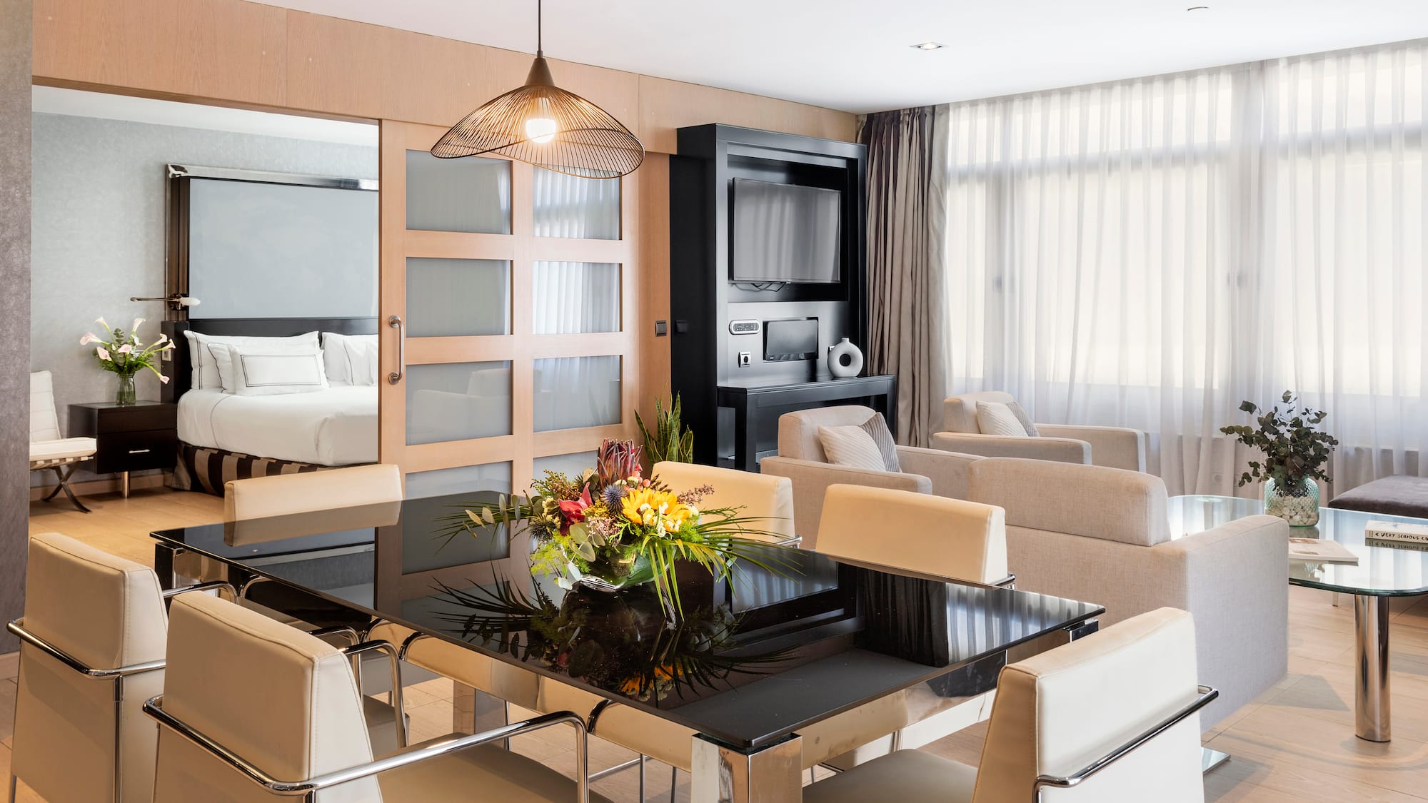 a room with a table and chairs