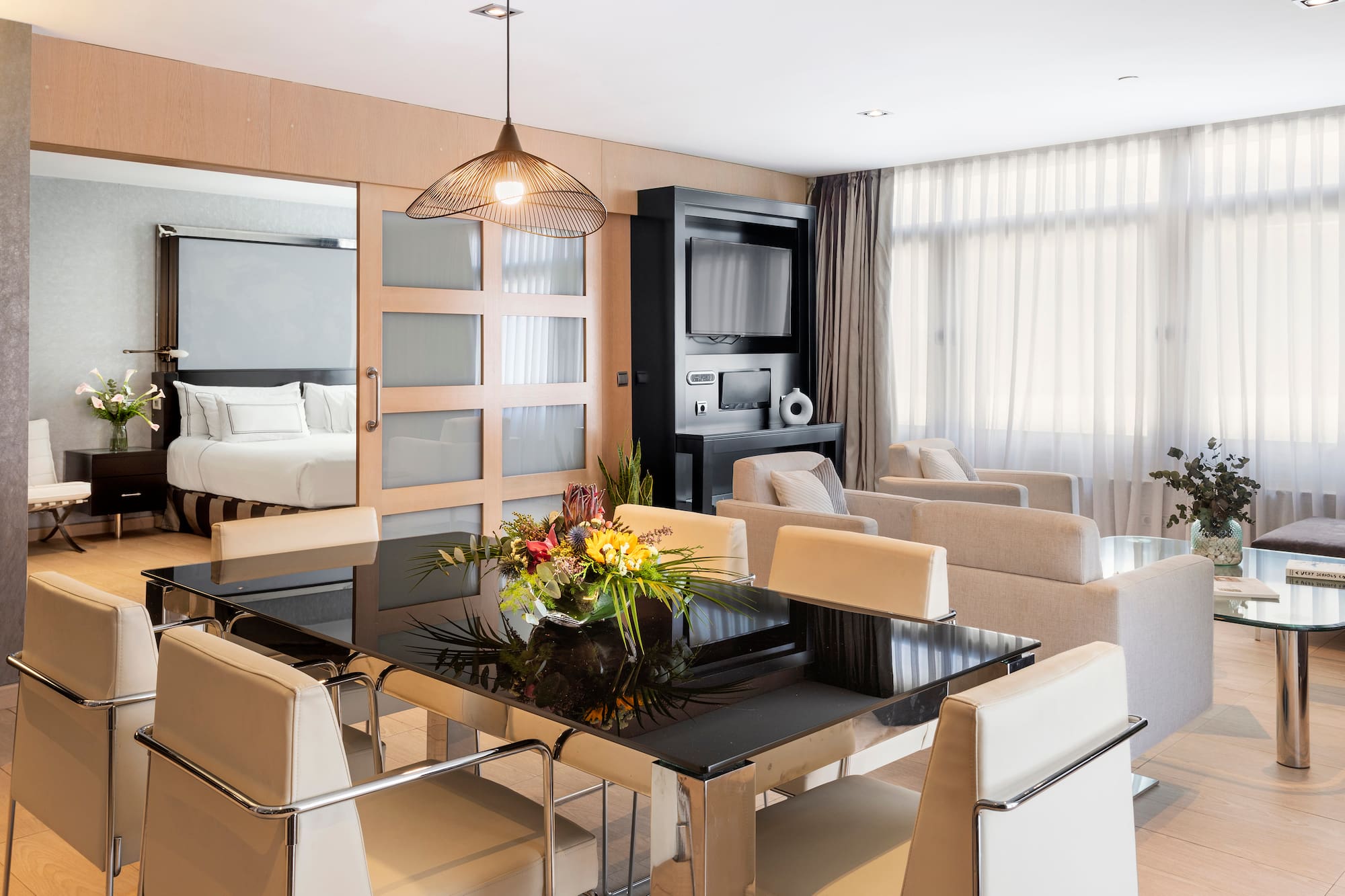 a room with a table and chairs