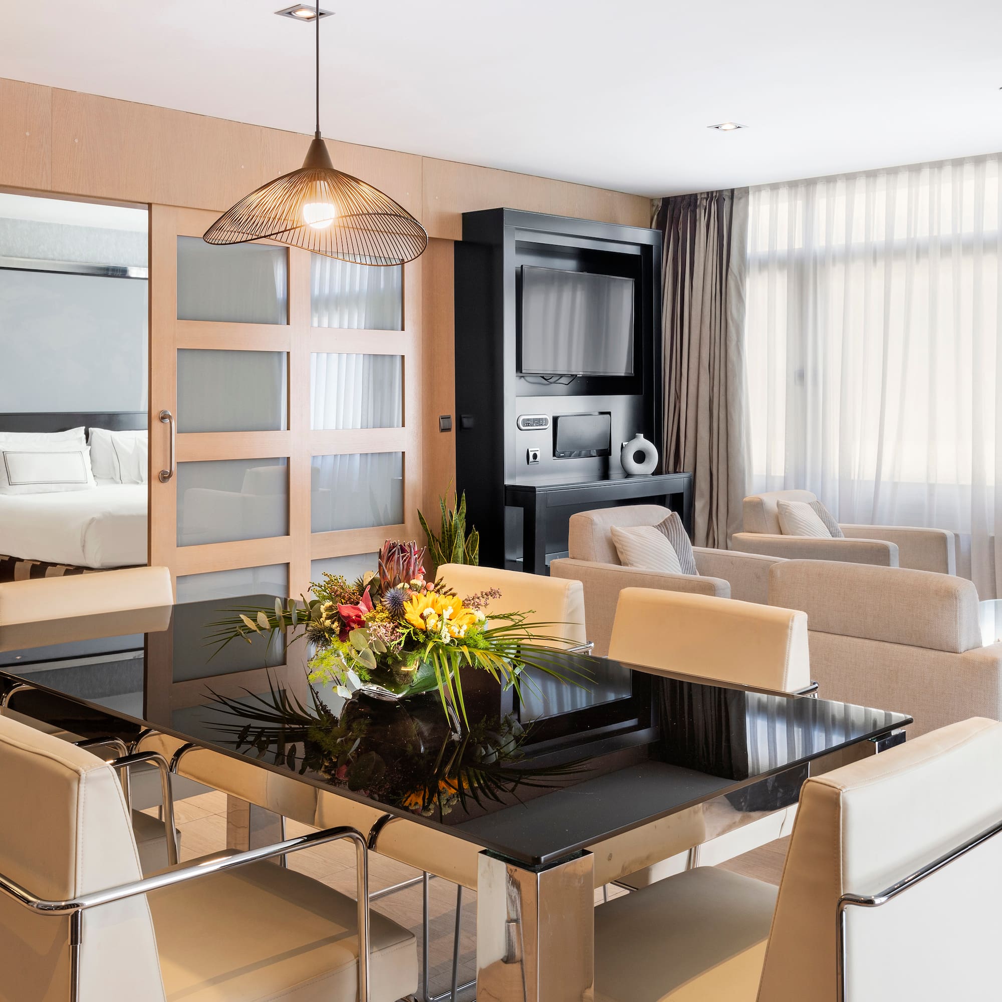 a room with a table and chairs