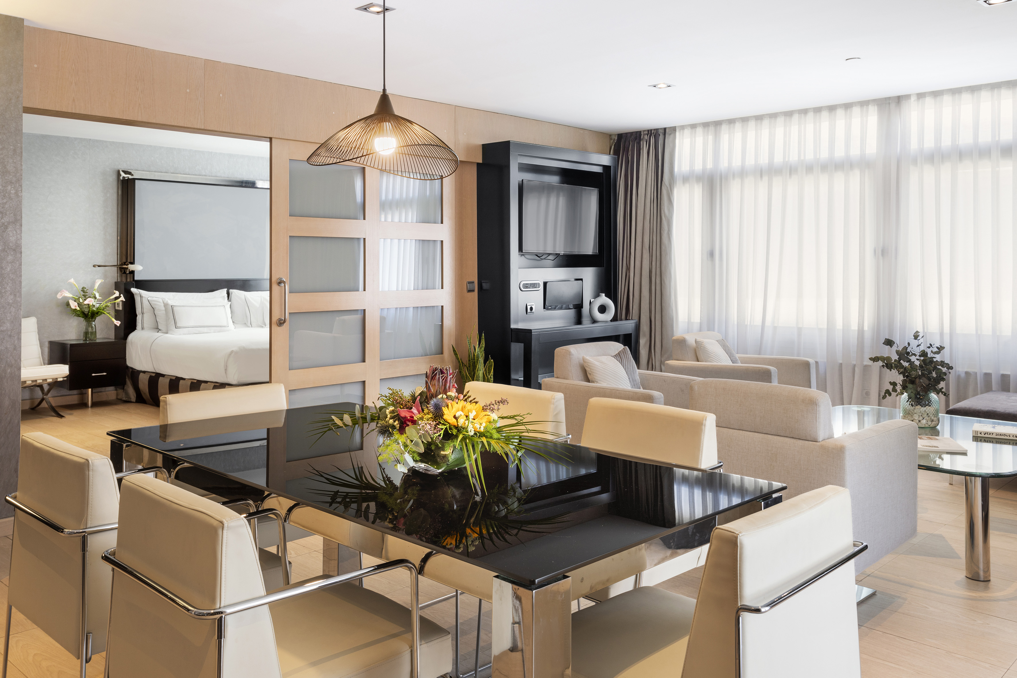 a room with a table and chairs