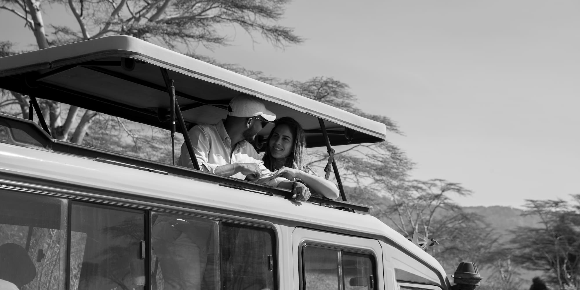 a man and woman on a vehicle