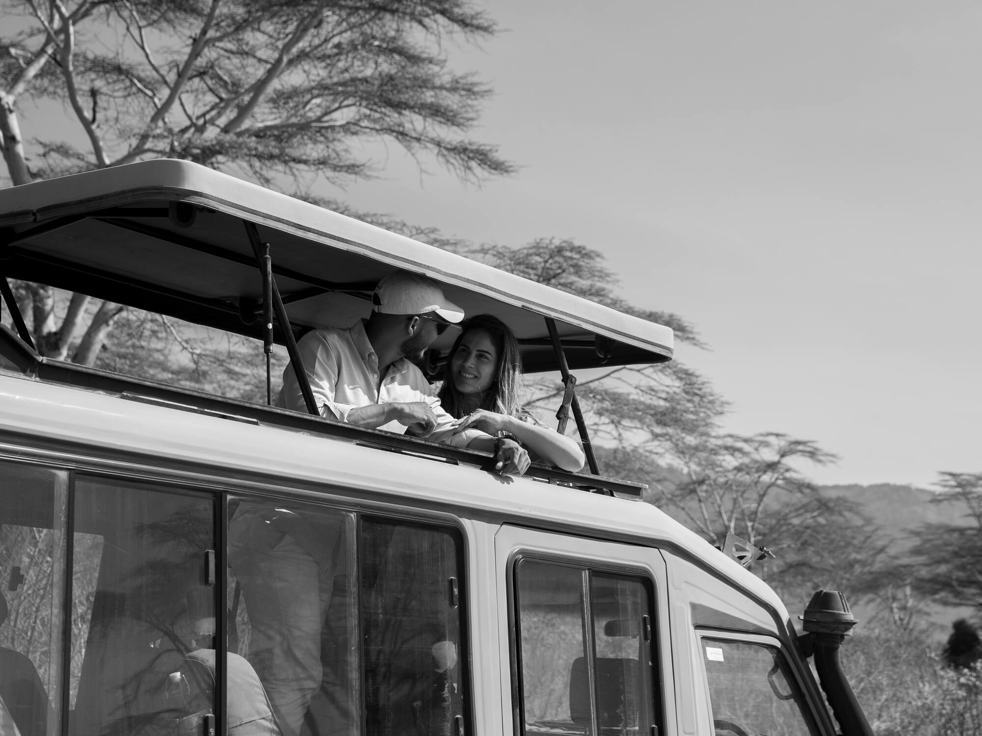 a man and woman on a vehicle