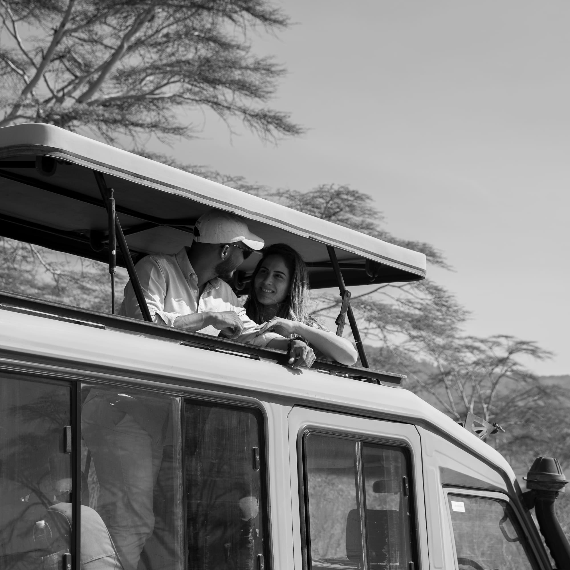 a man and woman on a vehicle