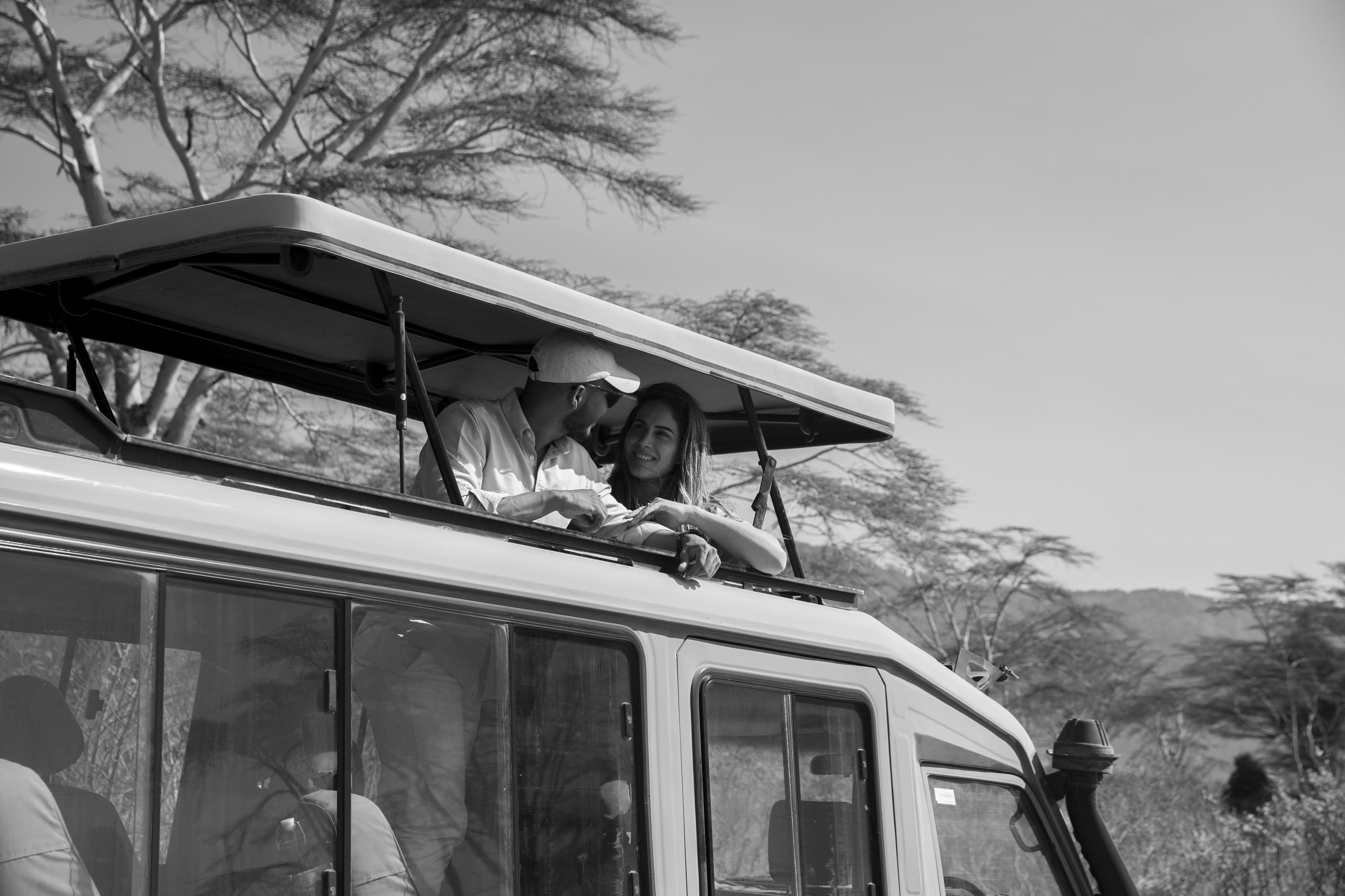 a man and woman on a vehicle